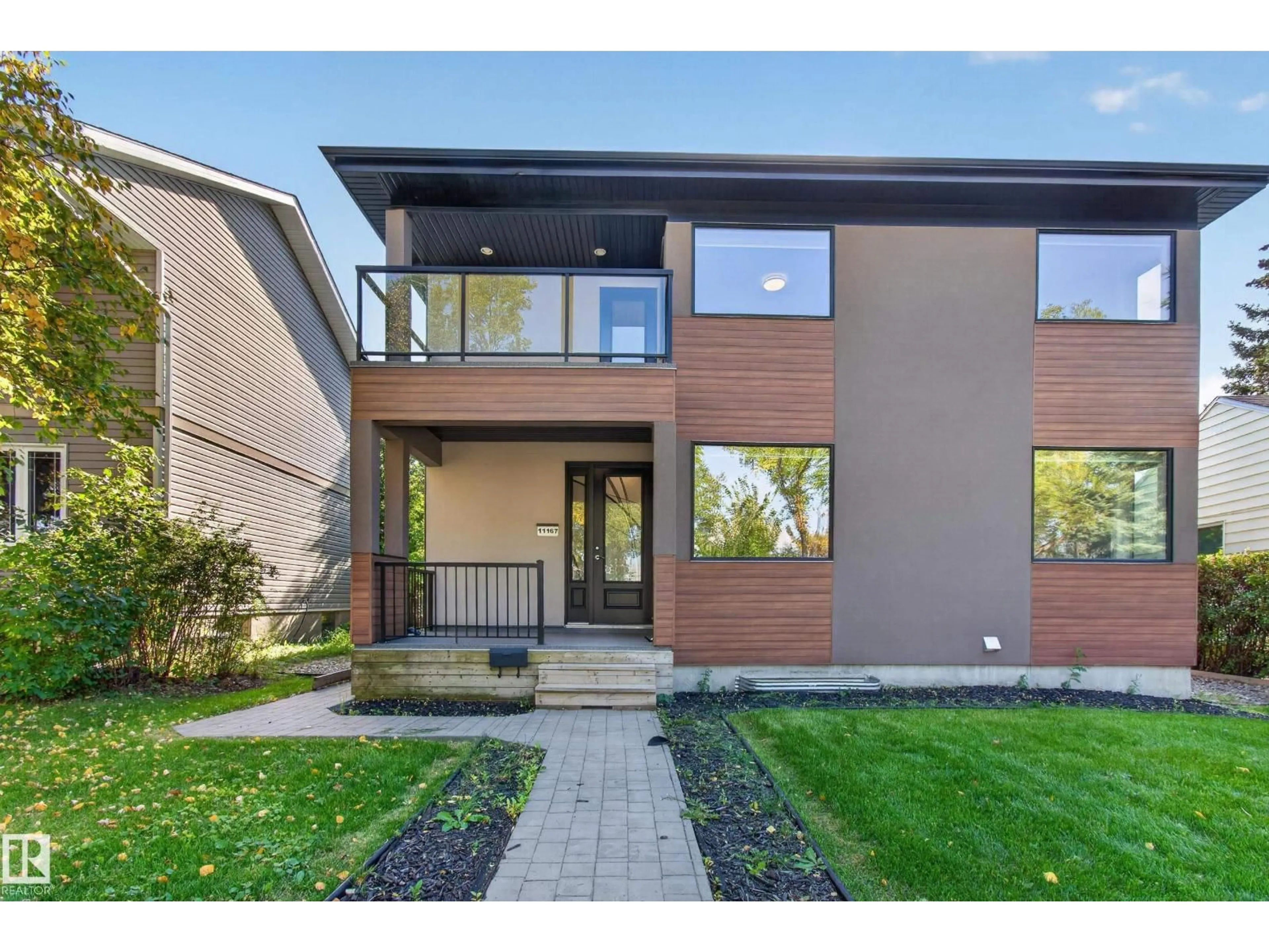 Home with brick exterior material, street for NW - 11167 62 AV, Edmonton Alberta T6H1N3
