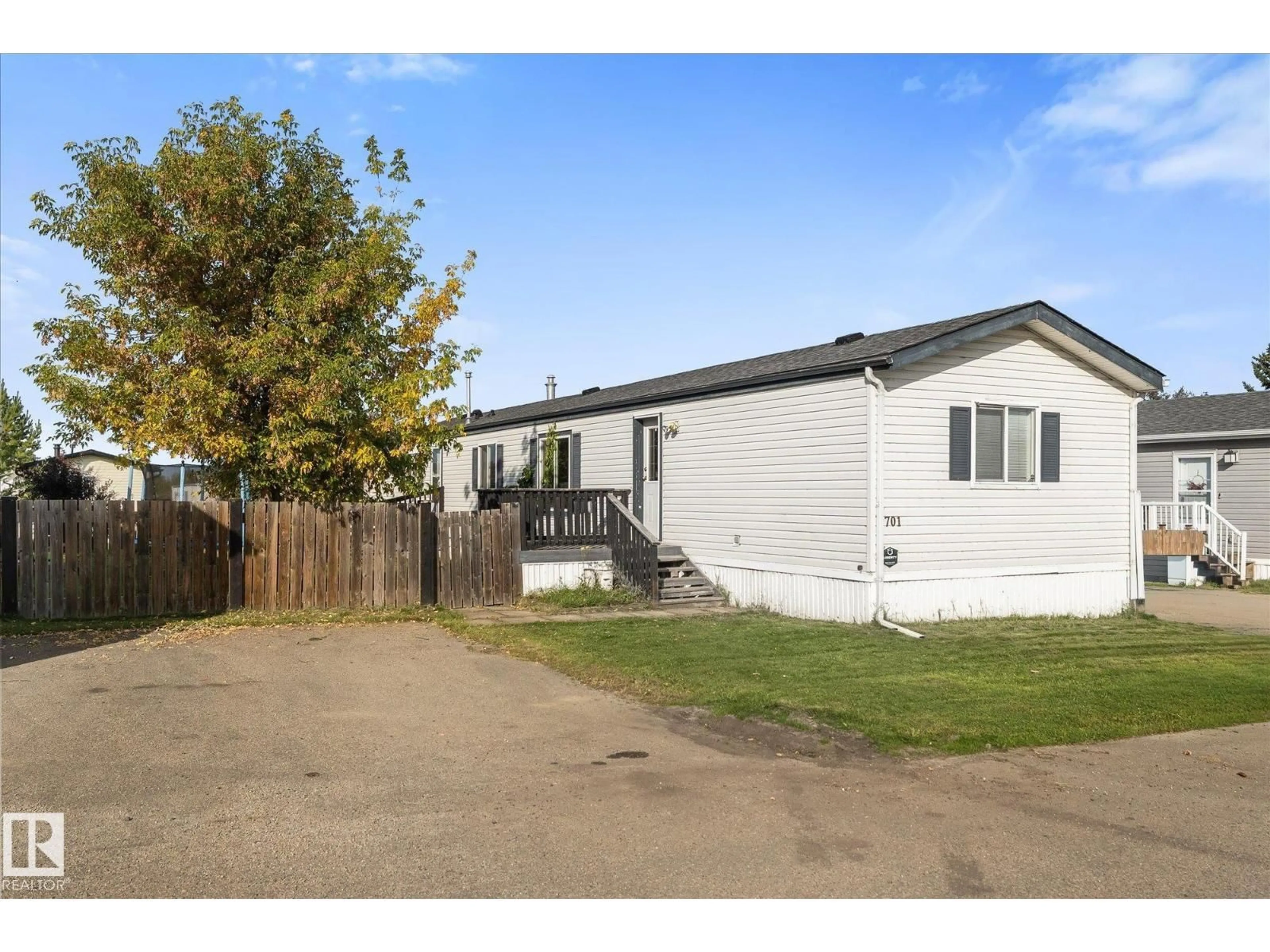 A pic from outside/outdoor area/front of a property/back of a property/a pic from drone, street for 701 53222 RANGE ROAD 272, Rural Parkland County Alberta T7X3P9