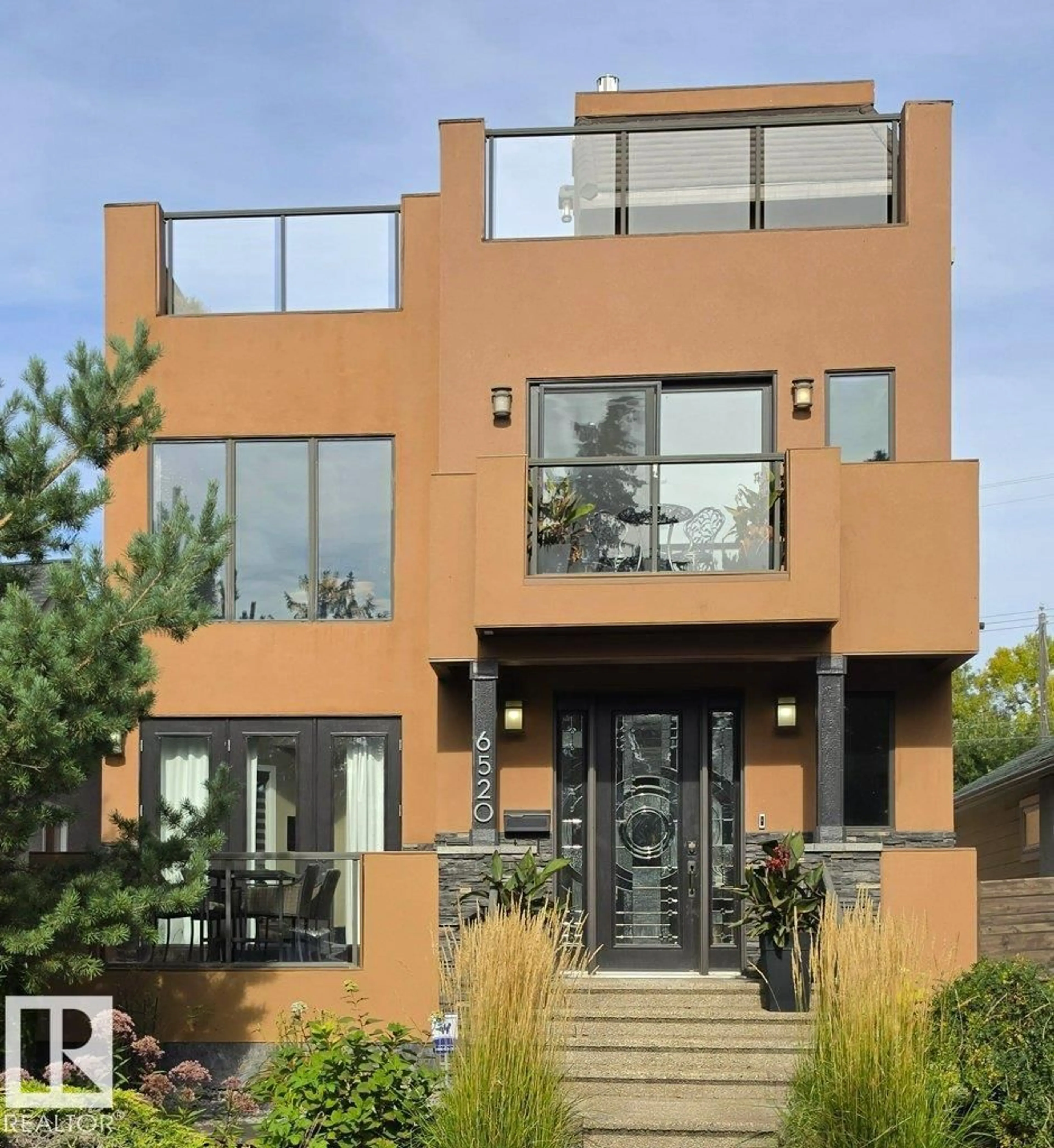 Home with brick exterior material, street for 6520 111 AV, Edmonton Alberta T5W0L8