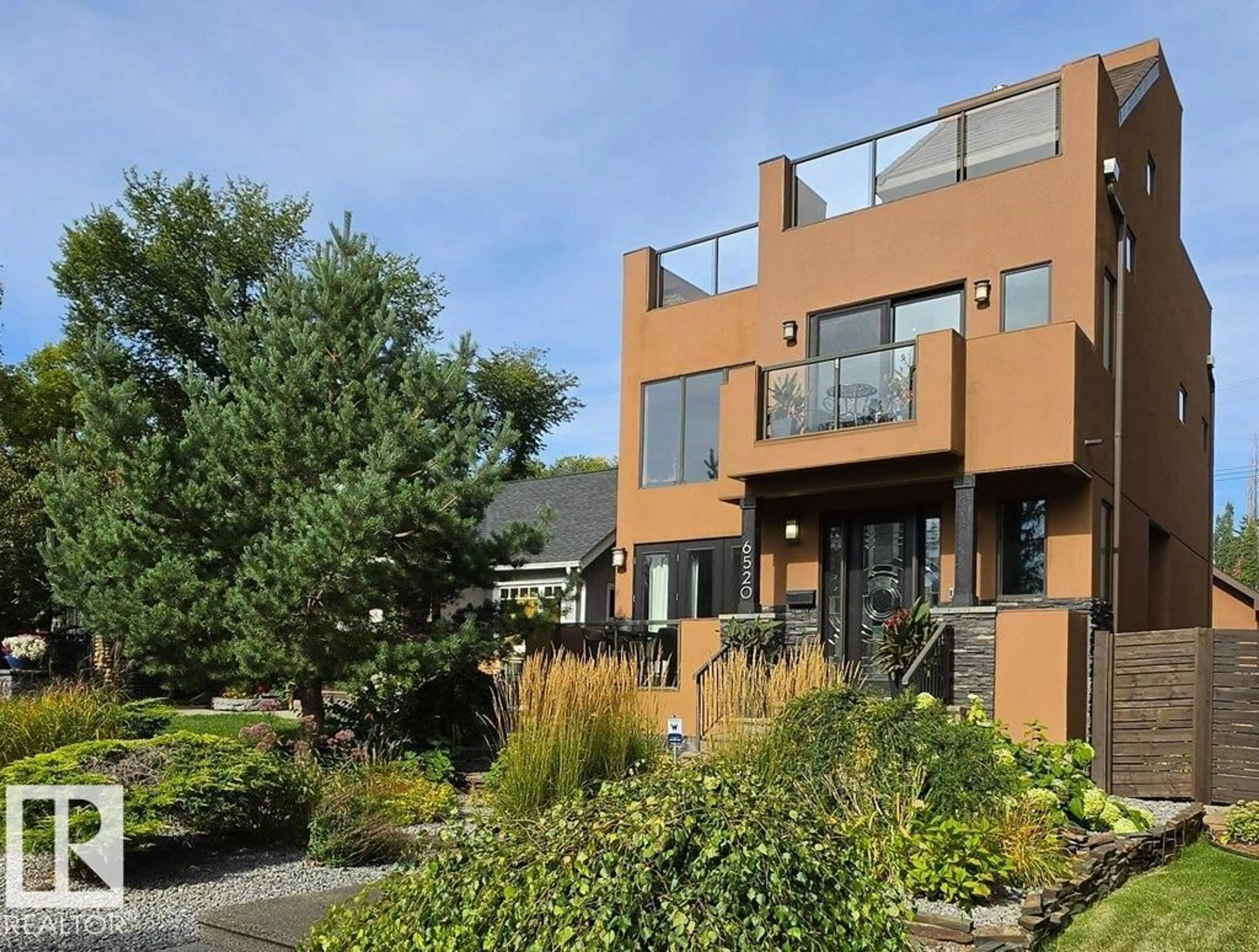 Home with brick exterior material, street for 6520 111 AV, Edmonton Alberta T5W0L8