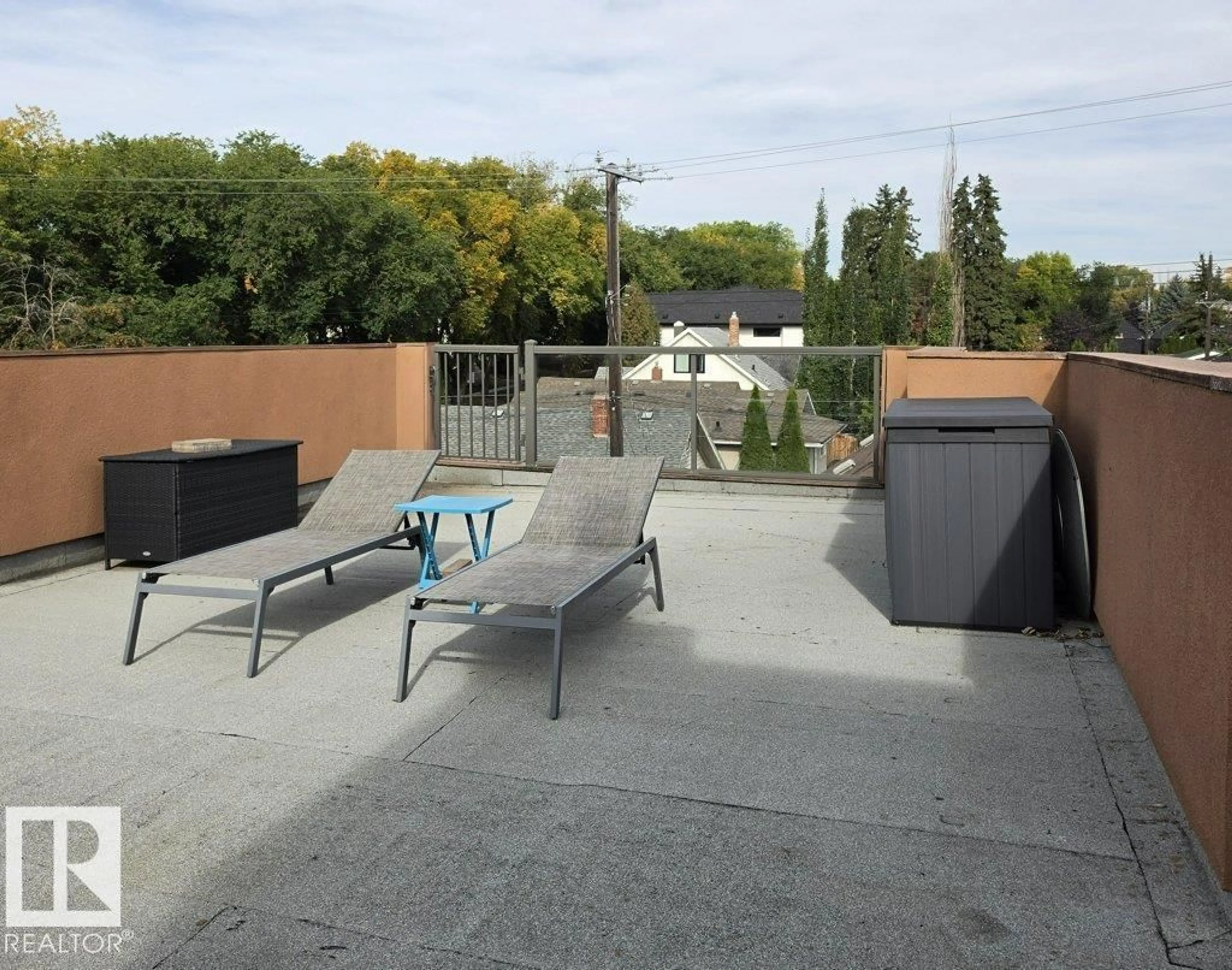 Patio, city buildings view from balcony for 6520 111 AV, Edmonton Alberta T5W0L8