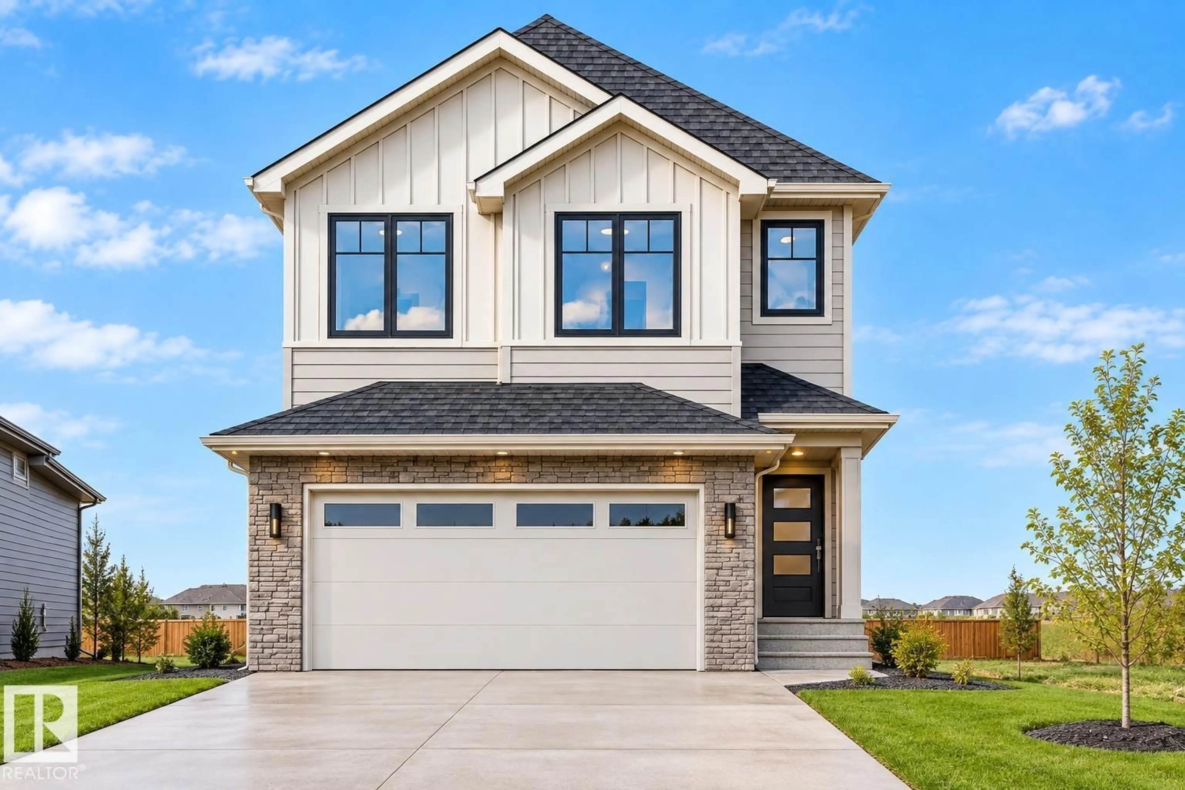 Home with brick exterior material, street for 19320 30 AV, Edmonton Alberta T6T2B3