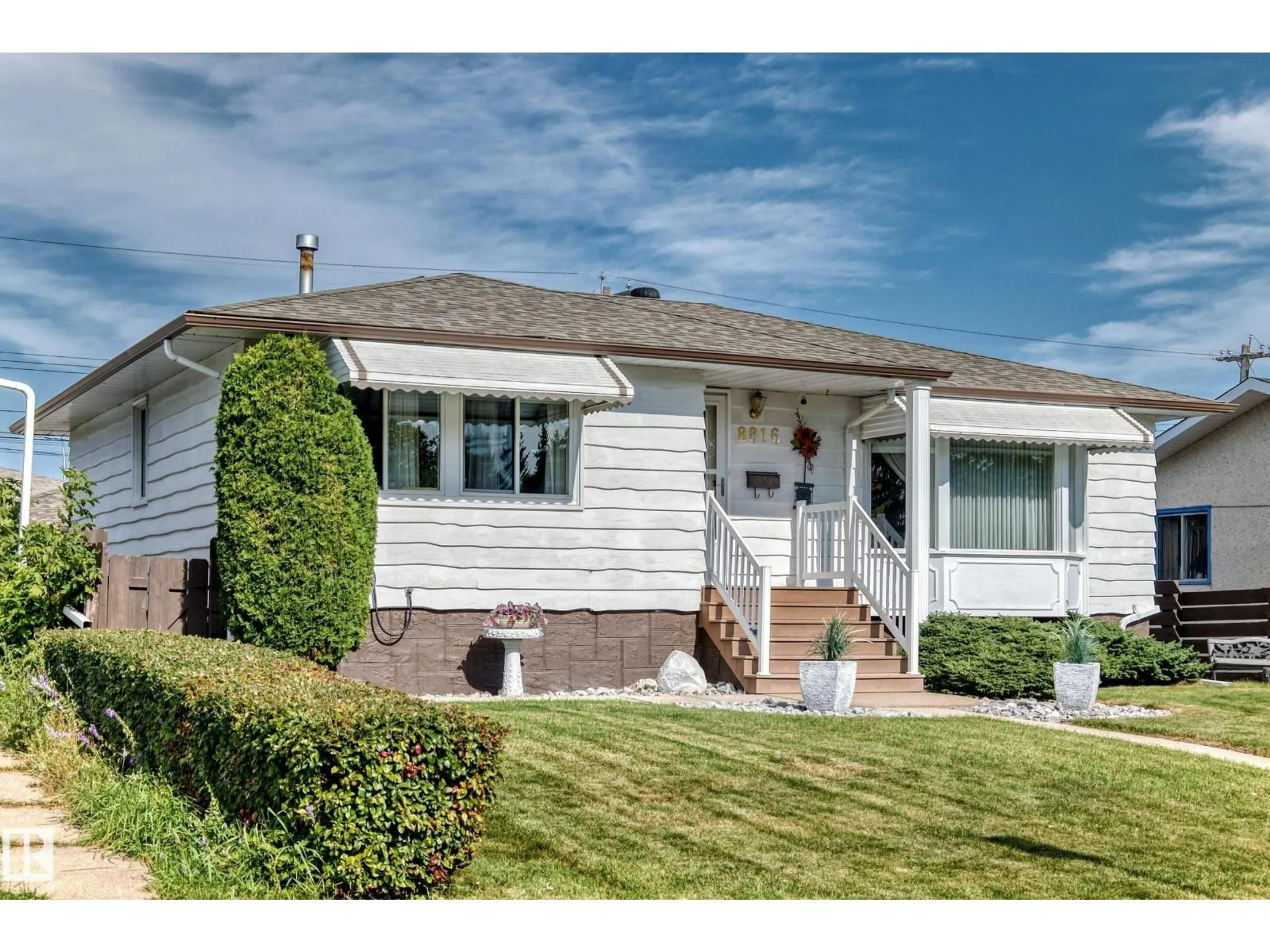 Home with vinyl exterior material, street for 8816 131A AV NW, Edmonton Alberta T5E0X2