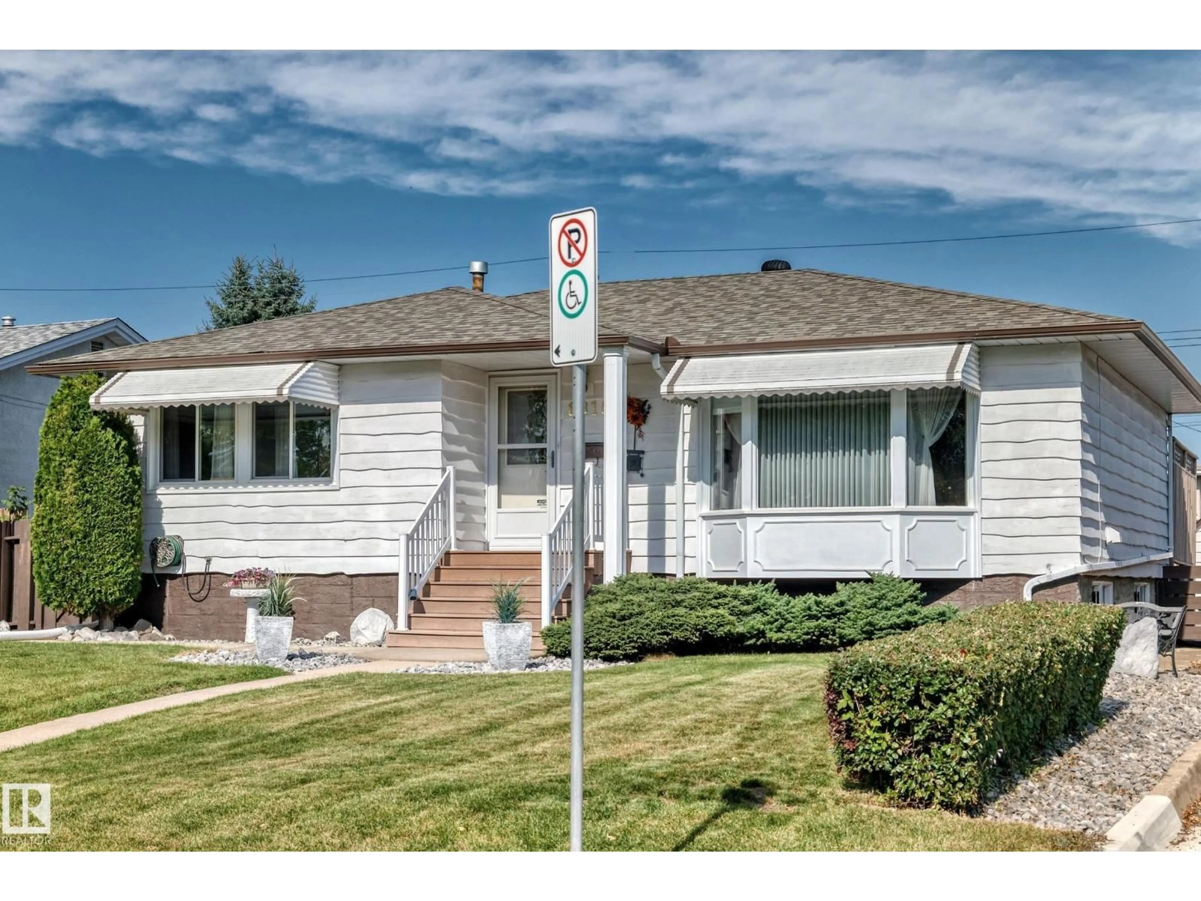 Home with vinyl exterior material, street for 8816 131A AV NW, Edmonton Alberta T5E0X2