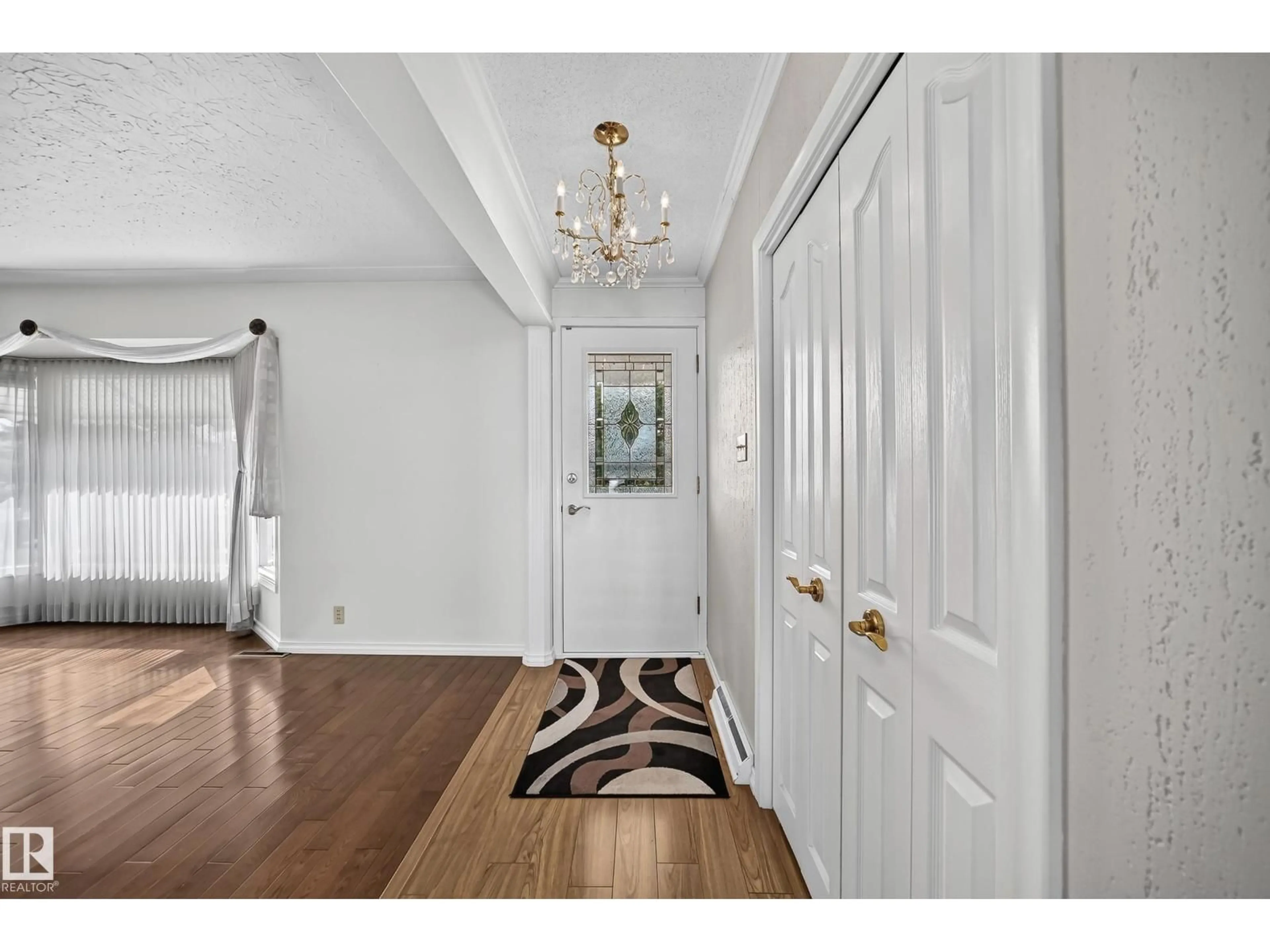 Indoor entryway for 8816 131A AV NW, Edmonton Alberta T5E0X2