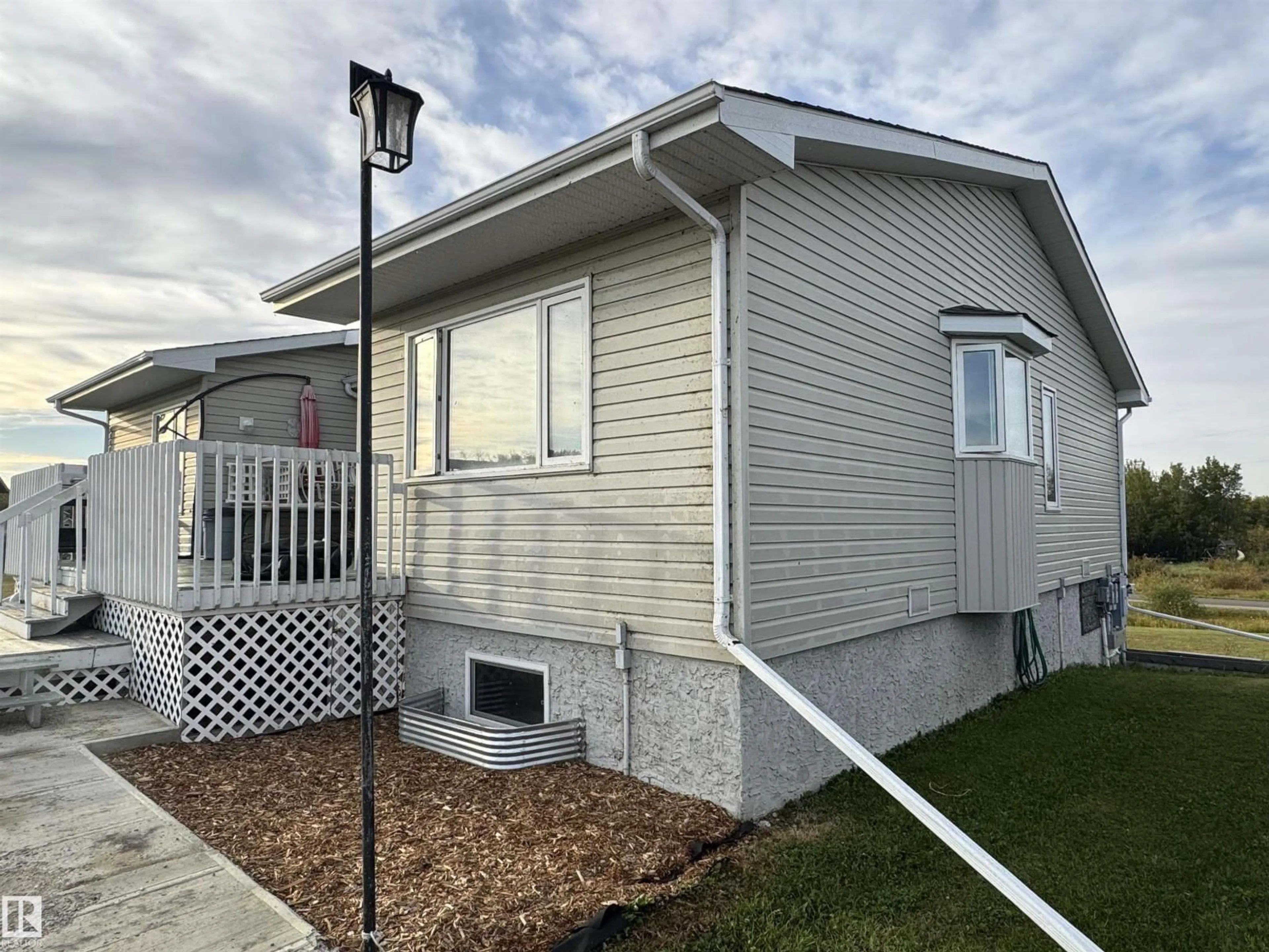 Home with vinyl exterior material, street for 20120 TWP RD 515, Rural Beaver County Alberta T0B4J1