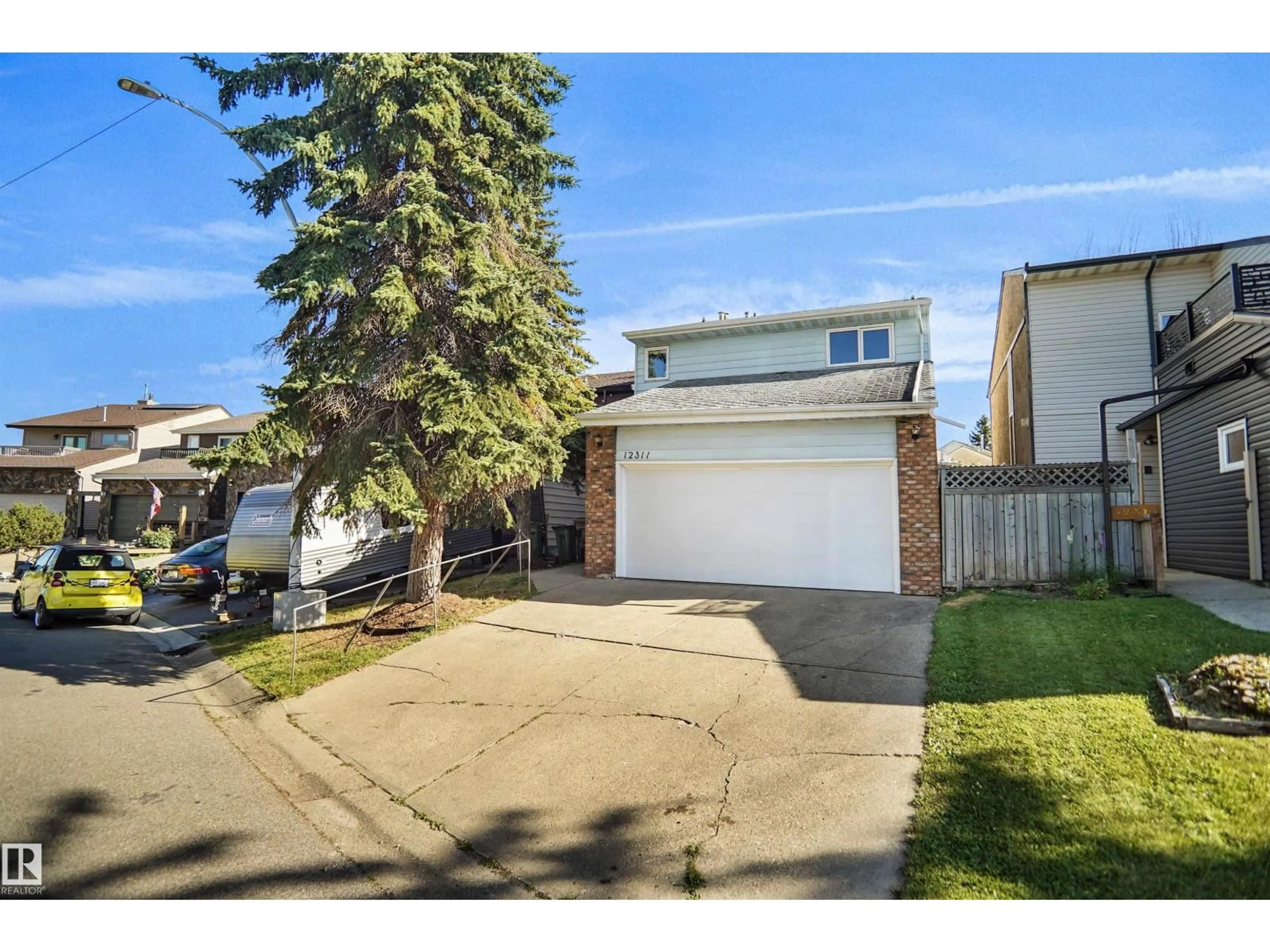 A pic from outside/outdoor area/front of a property/back of a property/a pic from drone, street for NW - 12311 25 AV, Edmonton Alberta T6J4S7