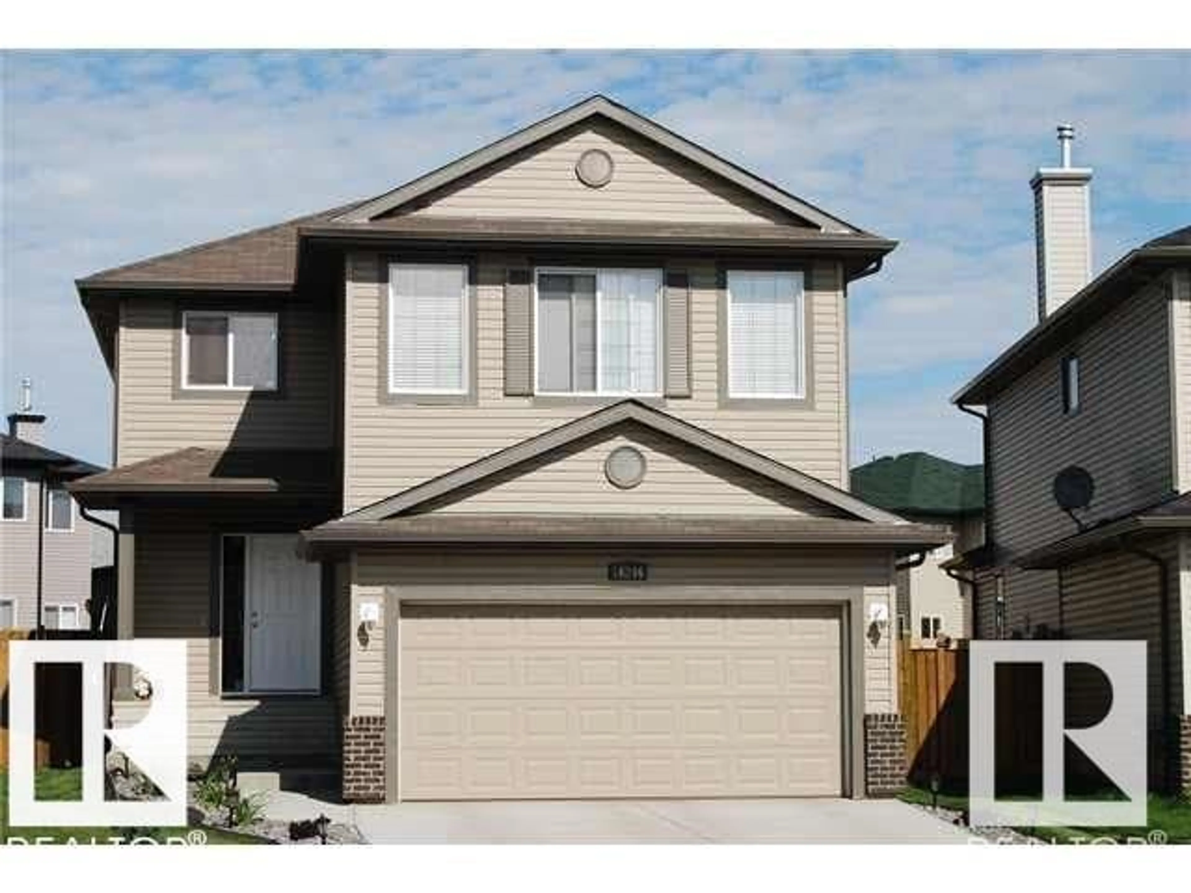 Home with vinyl exterior material, street for NW - 16246 48 ST, Edmonton Alberta T5Y3H7