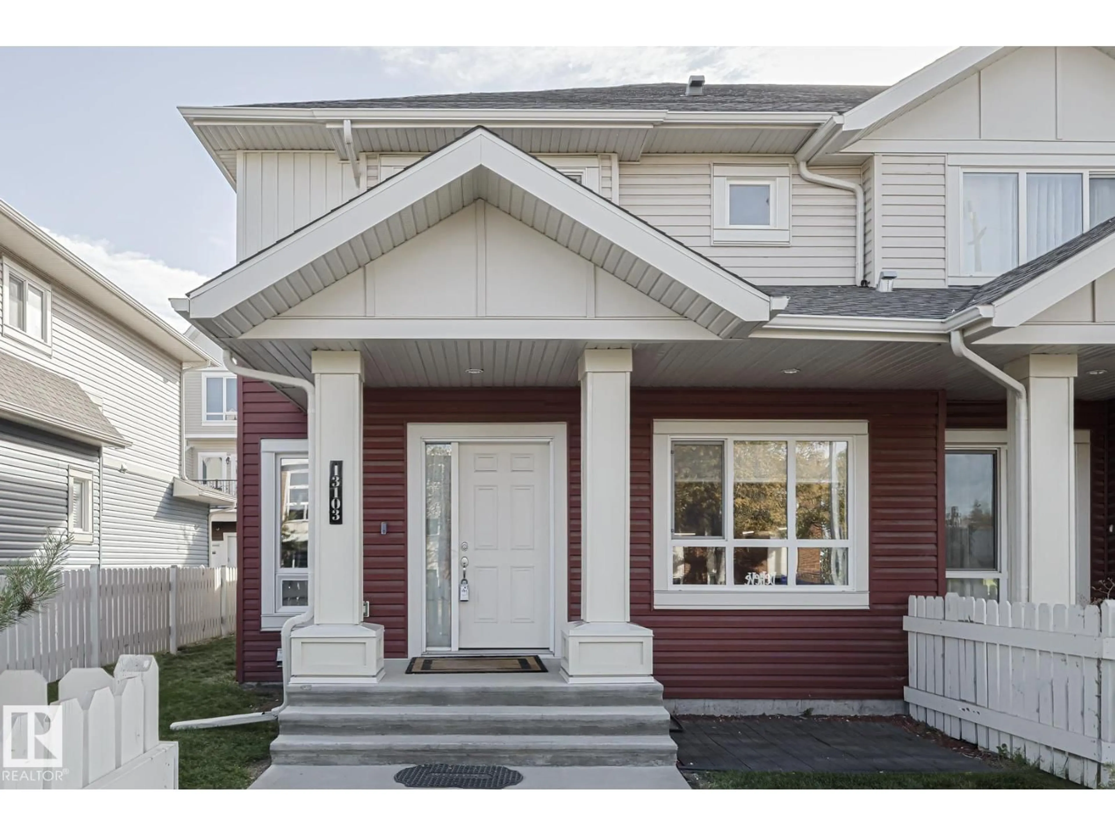 Home with vinyl exterior material, street for NW - 13103 132 AV, Edmonton Alberta T5L3R2