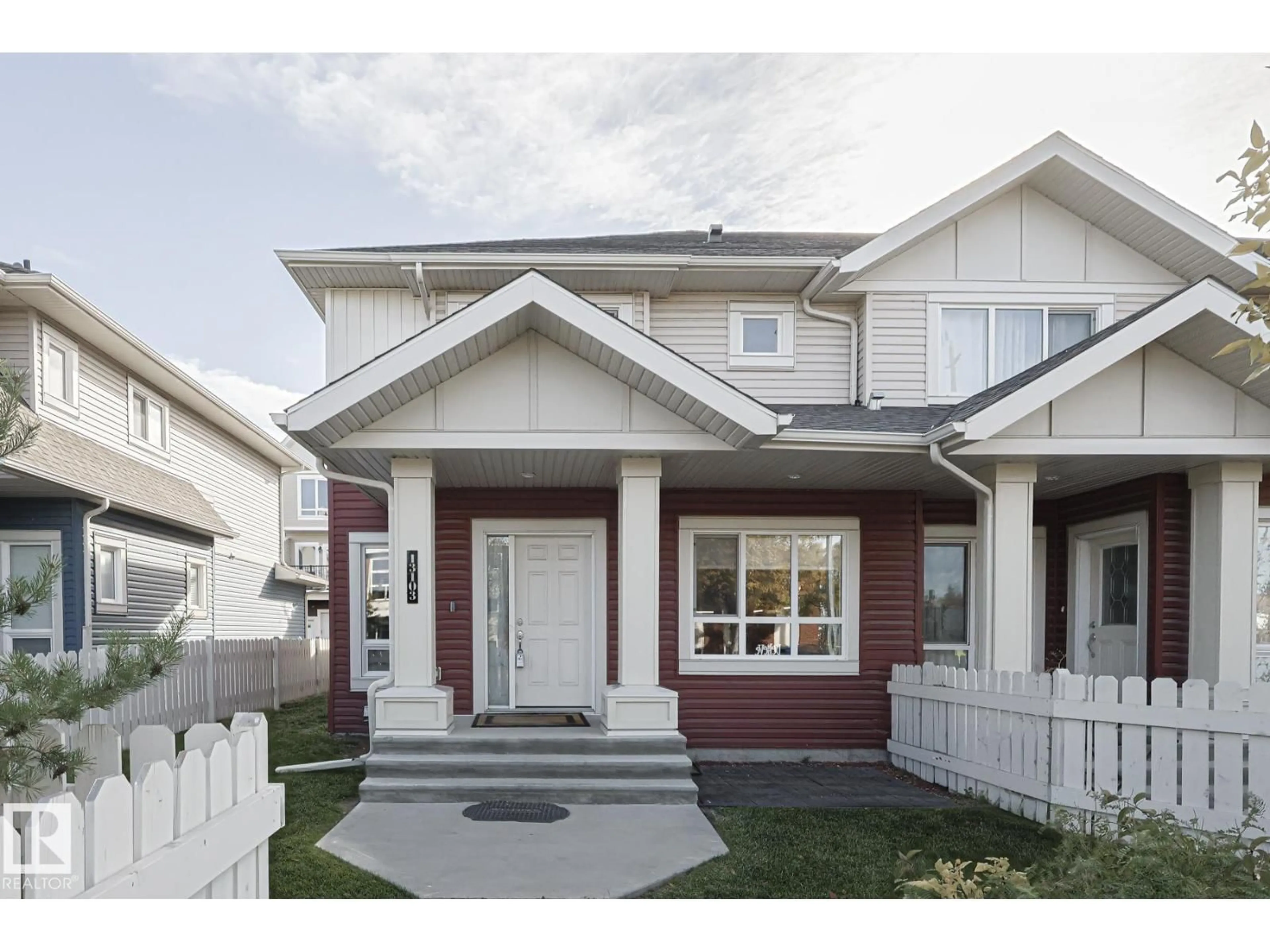 Home with vinyl exterior material, street for NW - 13103 132 AV, Edmonton Alberta T5L3R2