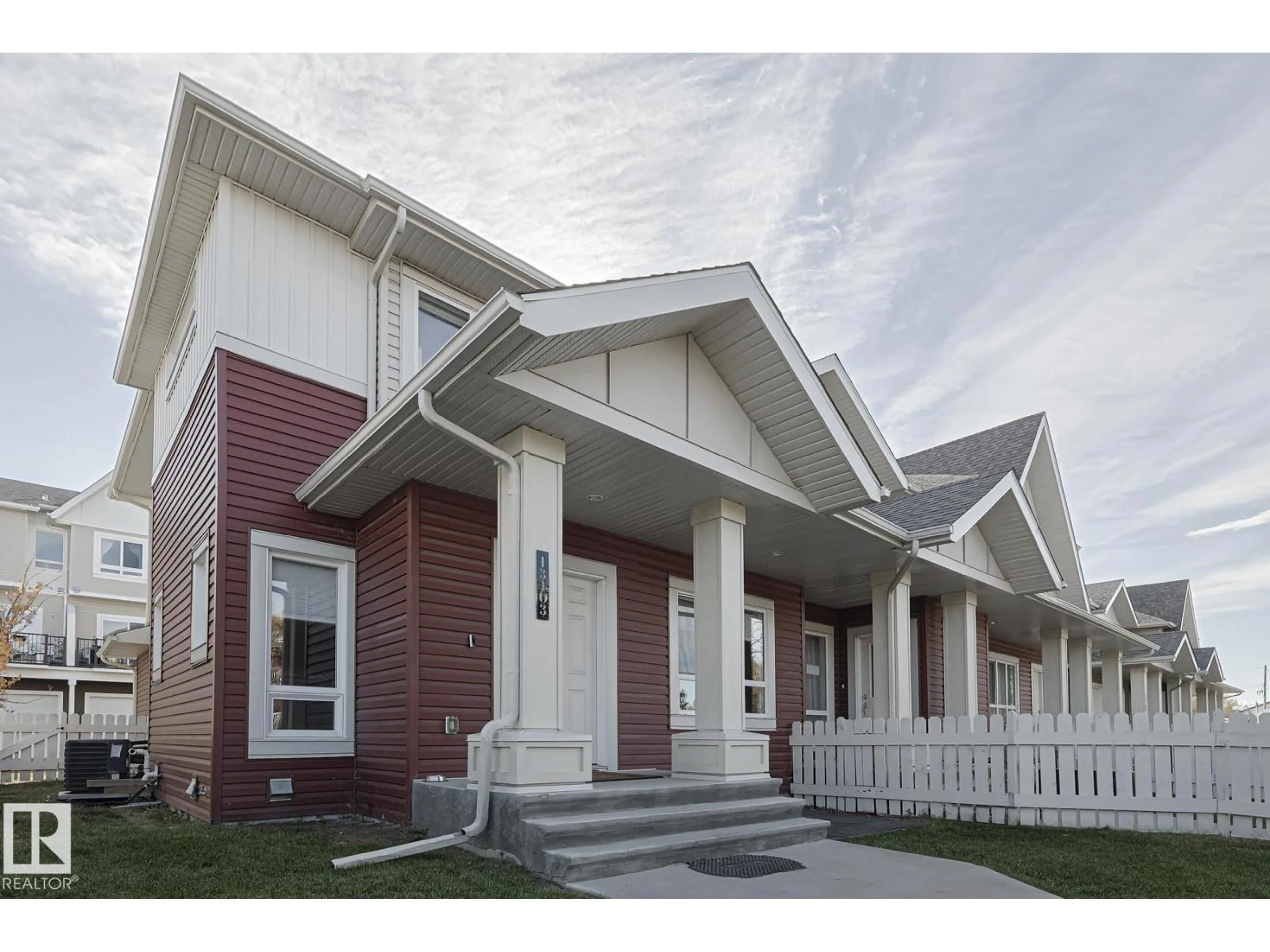 Home with vinyl exterior material, street for NW - 13103 132 AV, Edmonton Alberta T5L3R2