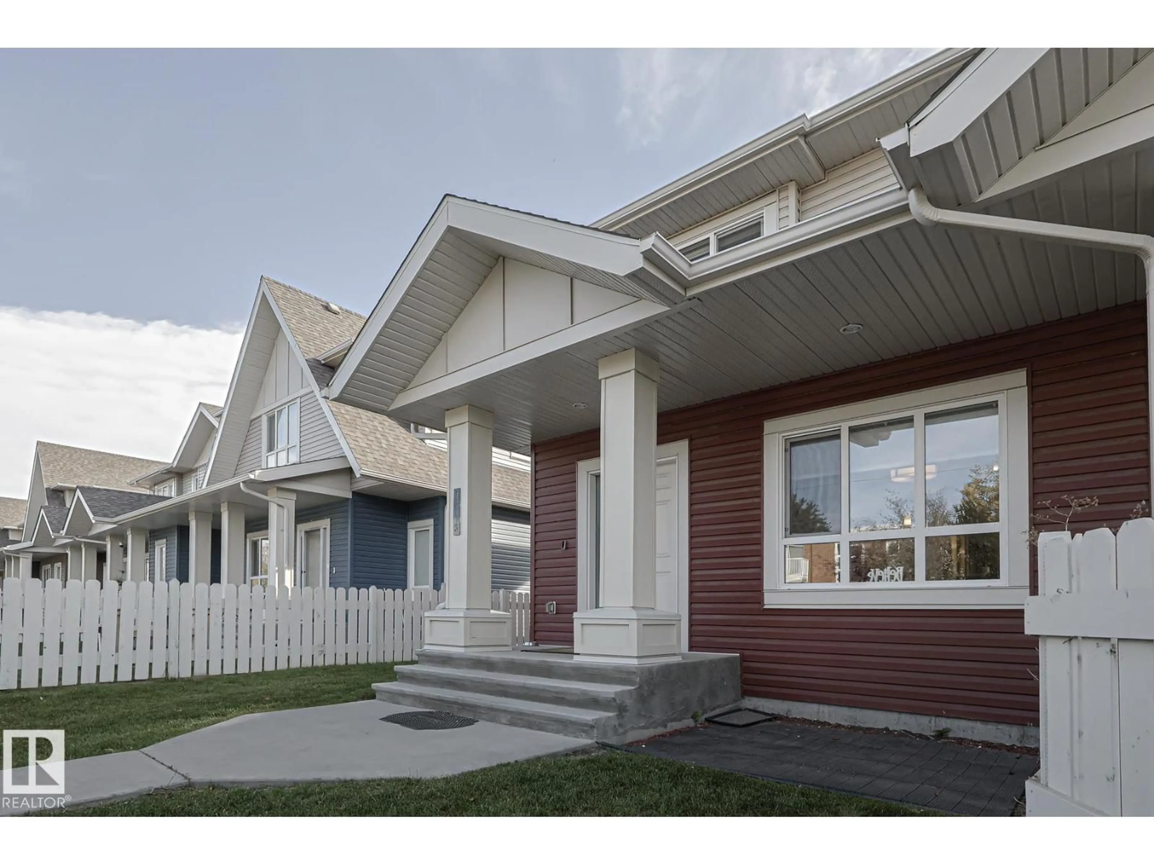 Home with vinyl exterior material, street for NW - 13103 132 AV, Edmonton Alberta T5L3R2