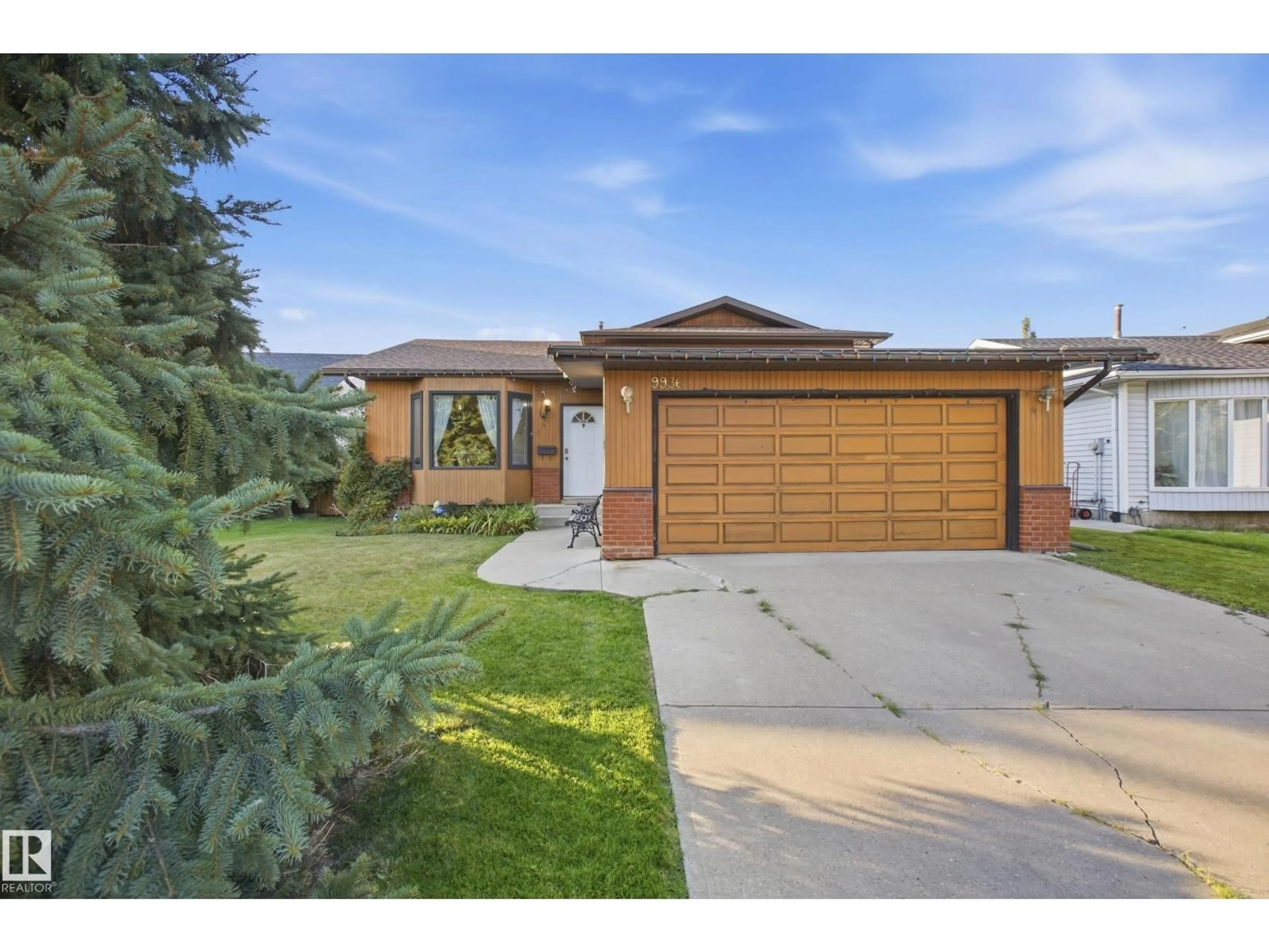 Home with vinyl exterior material, street for NW - 9936 190 ST, Edmonton Alberta T5T3X3
