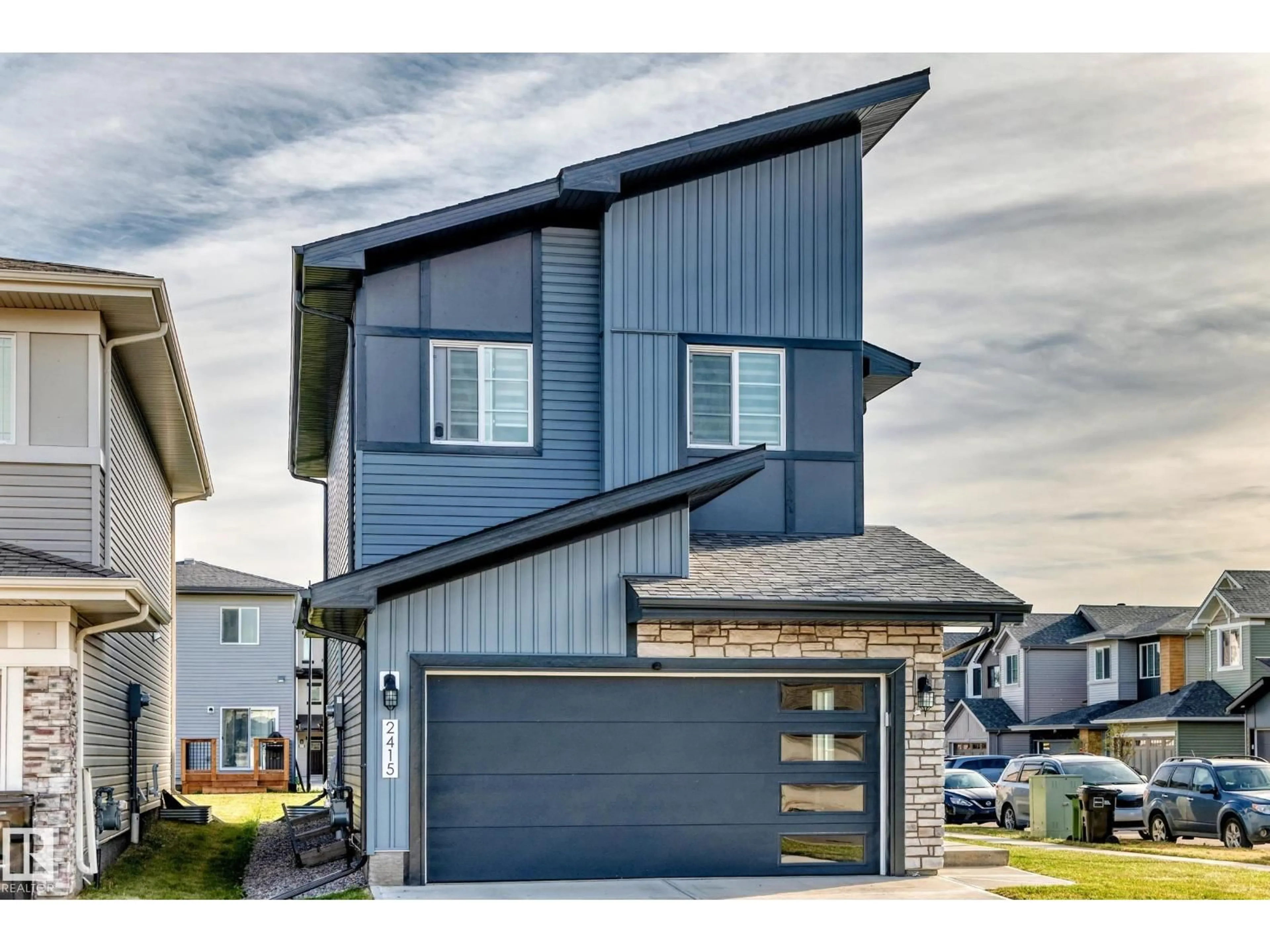 Home with vinyl exterior material, street for NW - 2415 194 ST, Edmonton Alberta T6M1P5