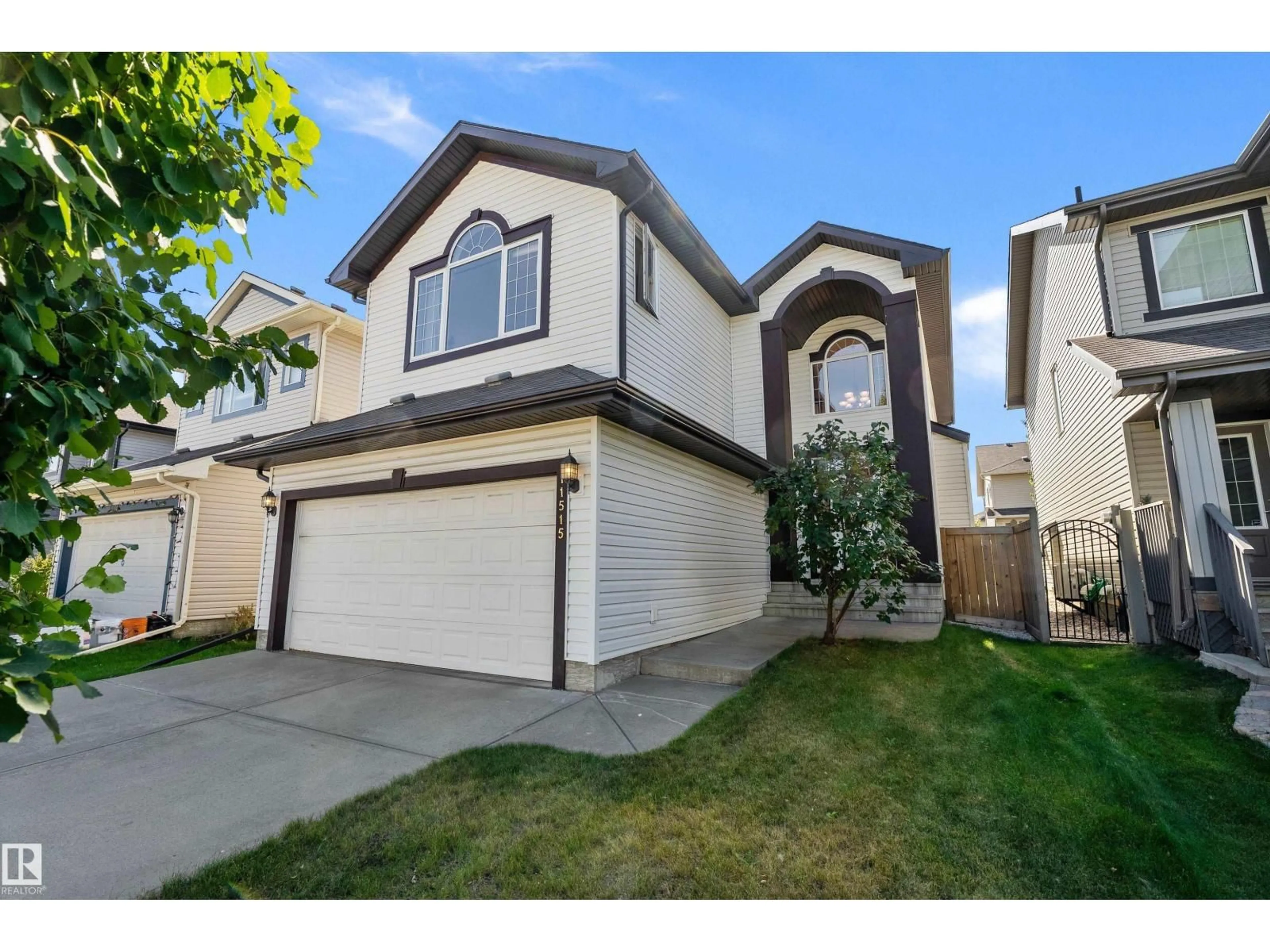 Home with vinyl exterior material, street for 11515 16 AV, Edmonton Alberta T6W0Z9