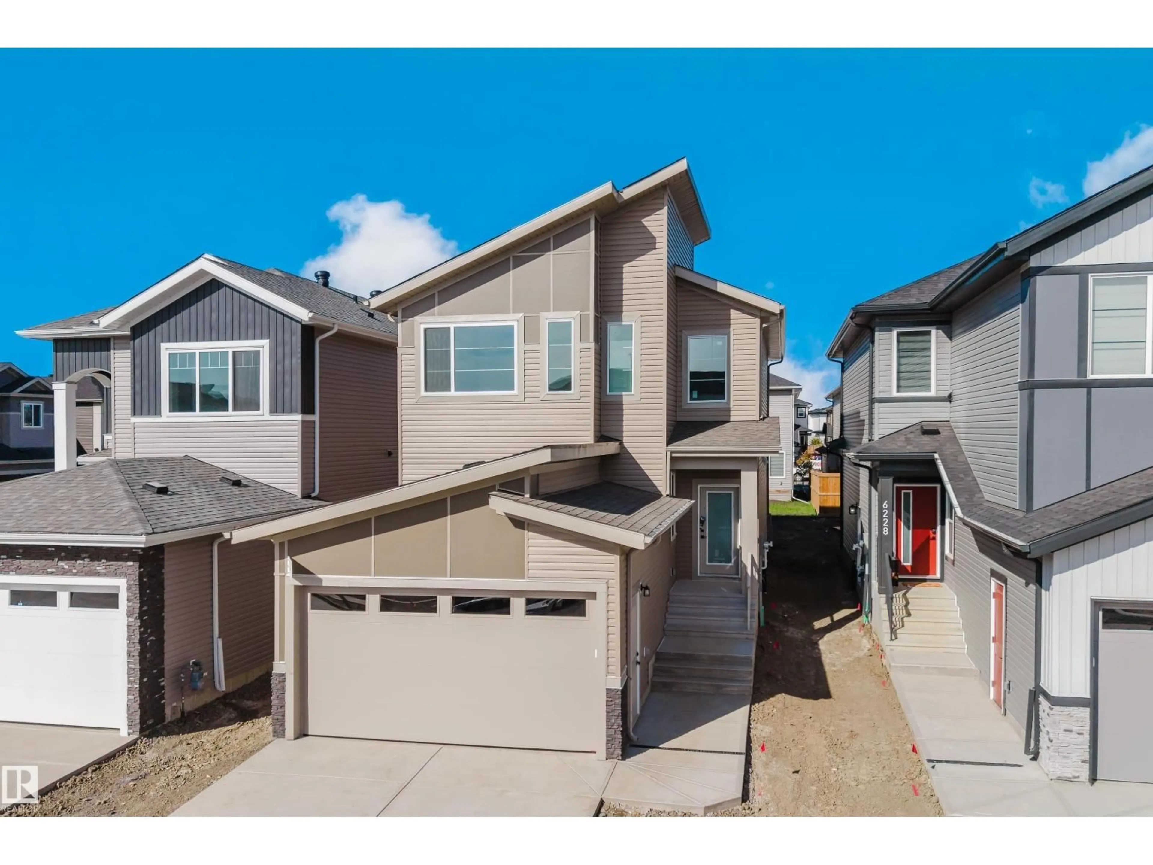 Home with vinyl exterior material, street for 6230 45 AV, Beaumont Alberta T4X0Z3