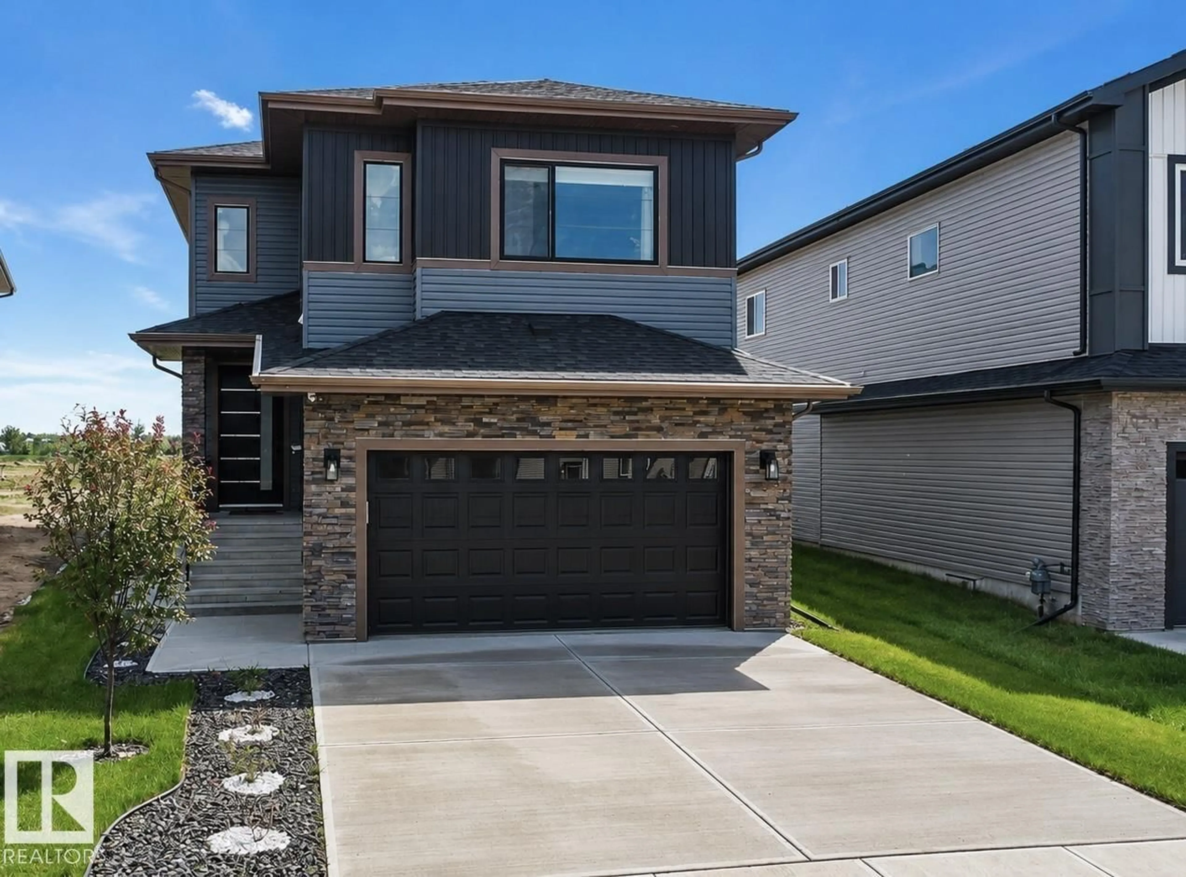 Home with brick exterior material, street for NE - 1837 63 AV, Rural Leduc County Alberta T4X3A4