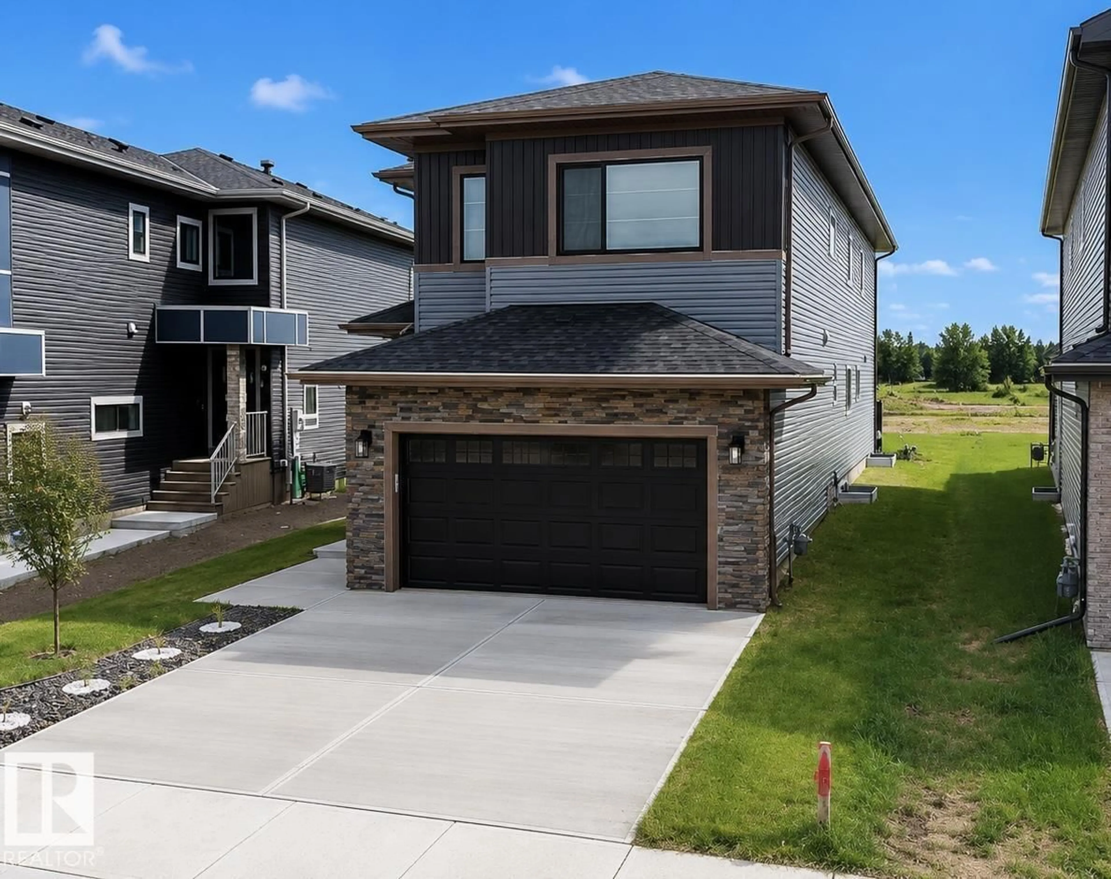 Home with brick exterior material, street for NE - 1837 63 AV, Rural Leduc County Alberta T4X3A4