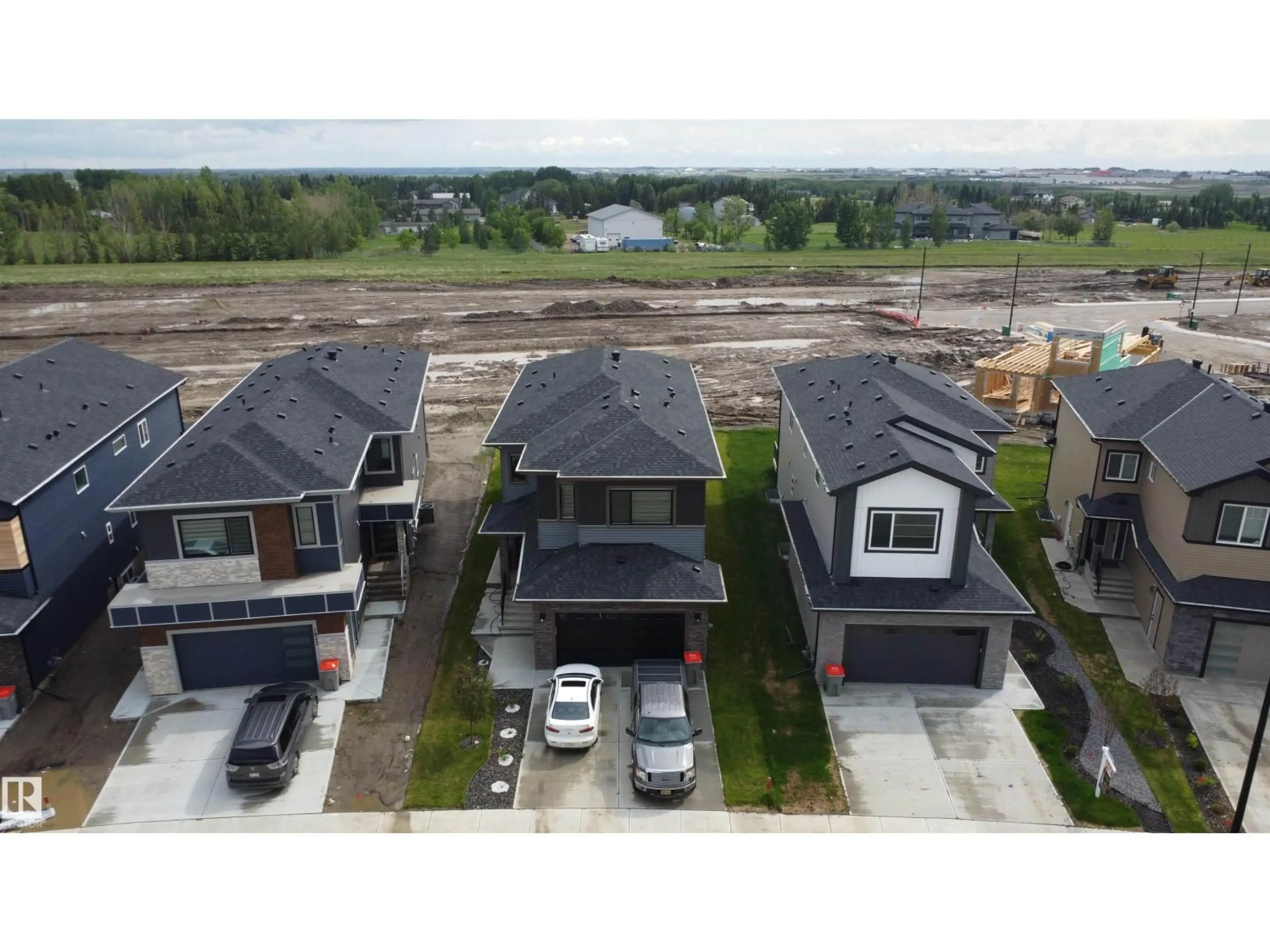 A pic from outside/outdoor area/front of a property/back of a property/a pic from drone, unknown for NE - 1837 63 AV, Rural Leduc County Alberta T4X3A4
