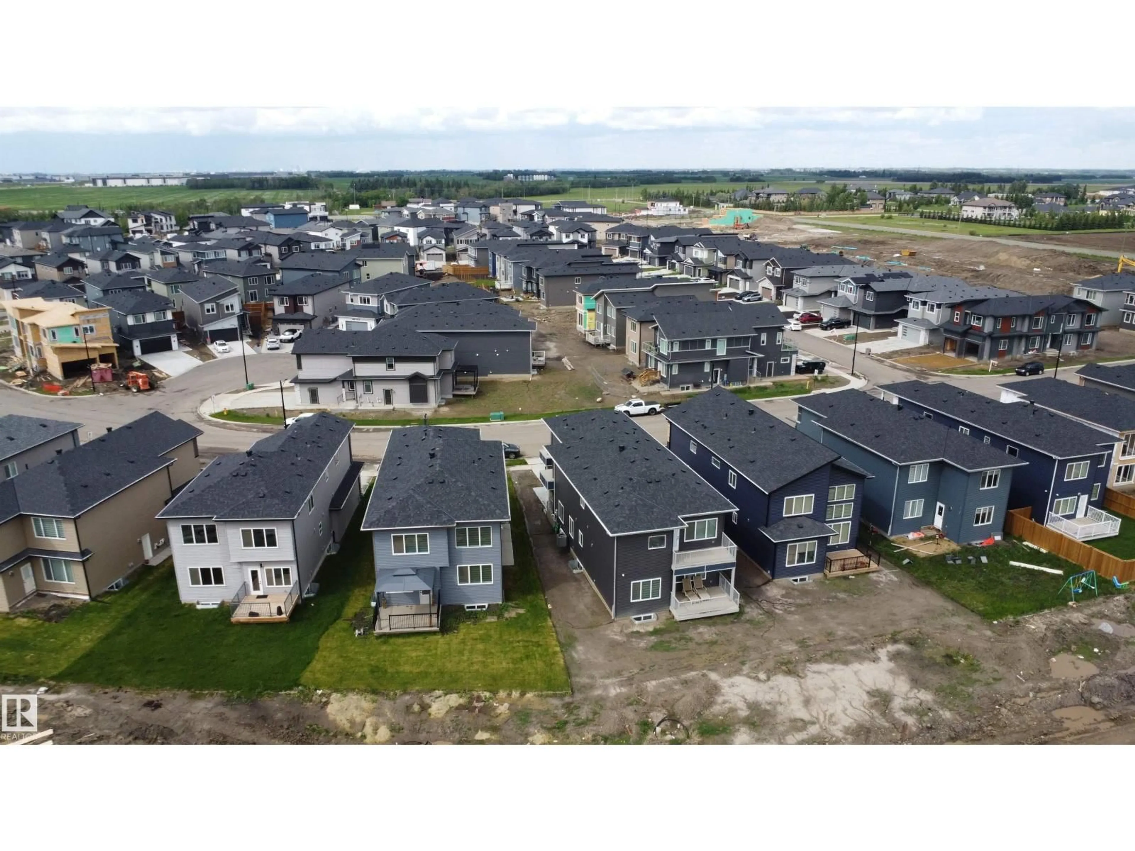 A pic from outside/outdoor area/front of a property/back of a property/a pic from drone, street for NE - 1837 63 AV, Rural Leduc County Alberta T4X3A4