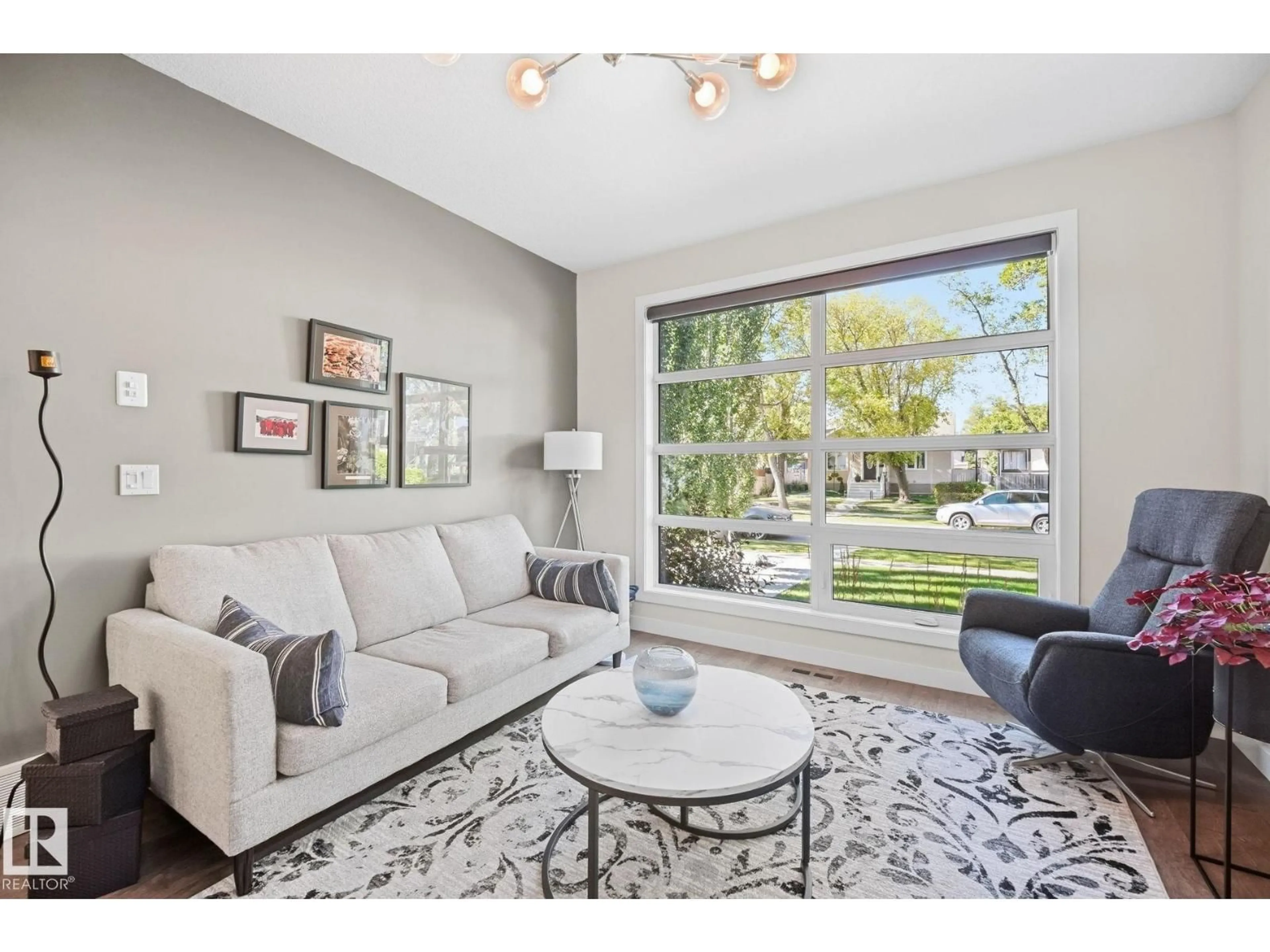 Living room with furniture, unknown for 10413 145 ST, Edmonton Alberta T5N2X9