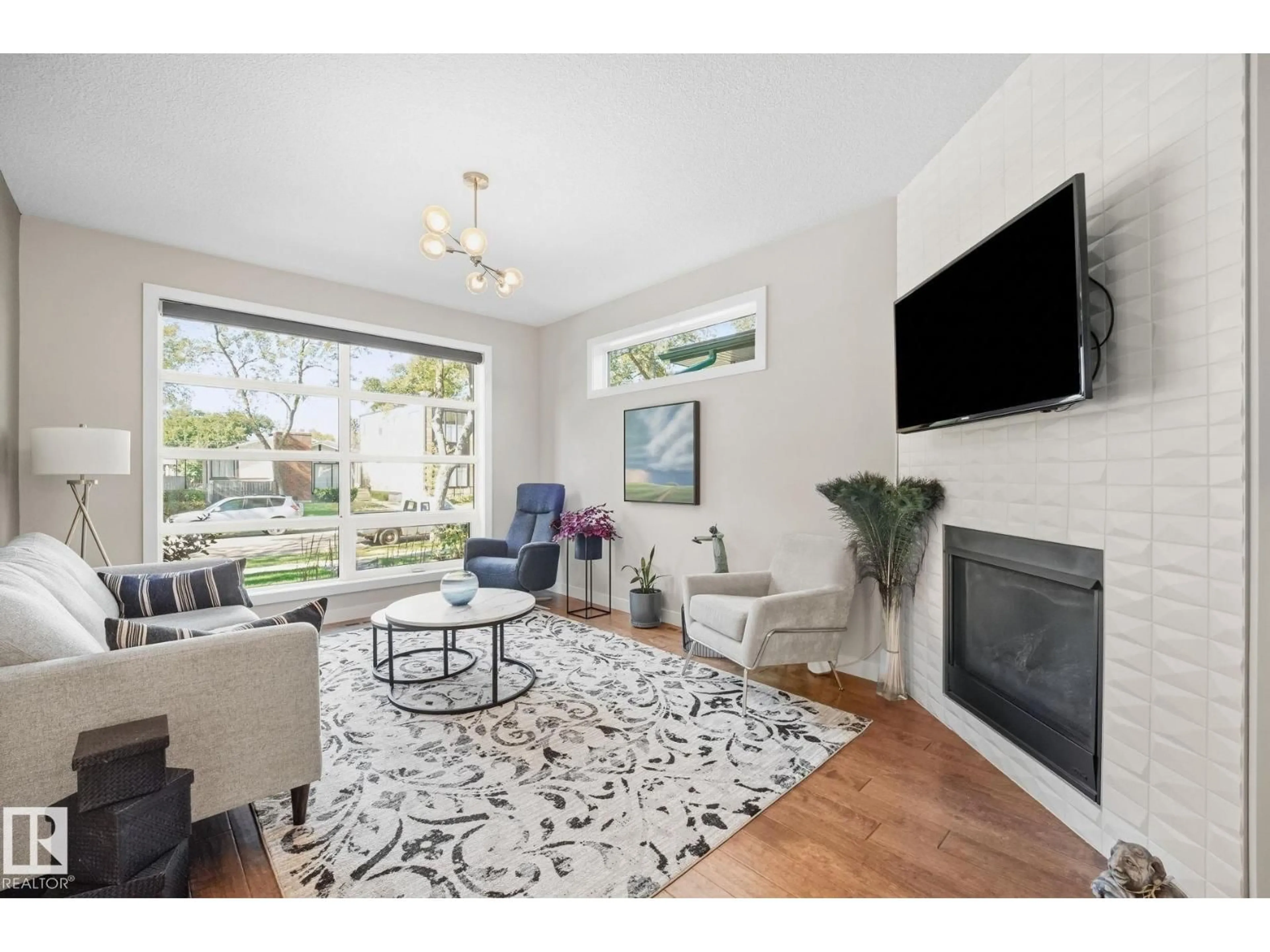 Living room with furniture, unknown for 10413 145 ST, Edmonton Alberta T5N2X9