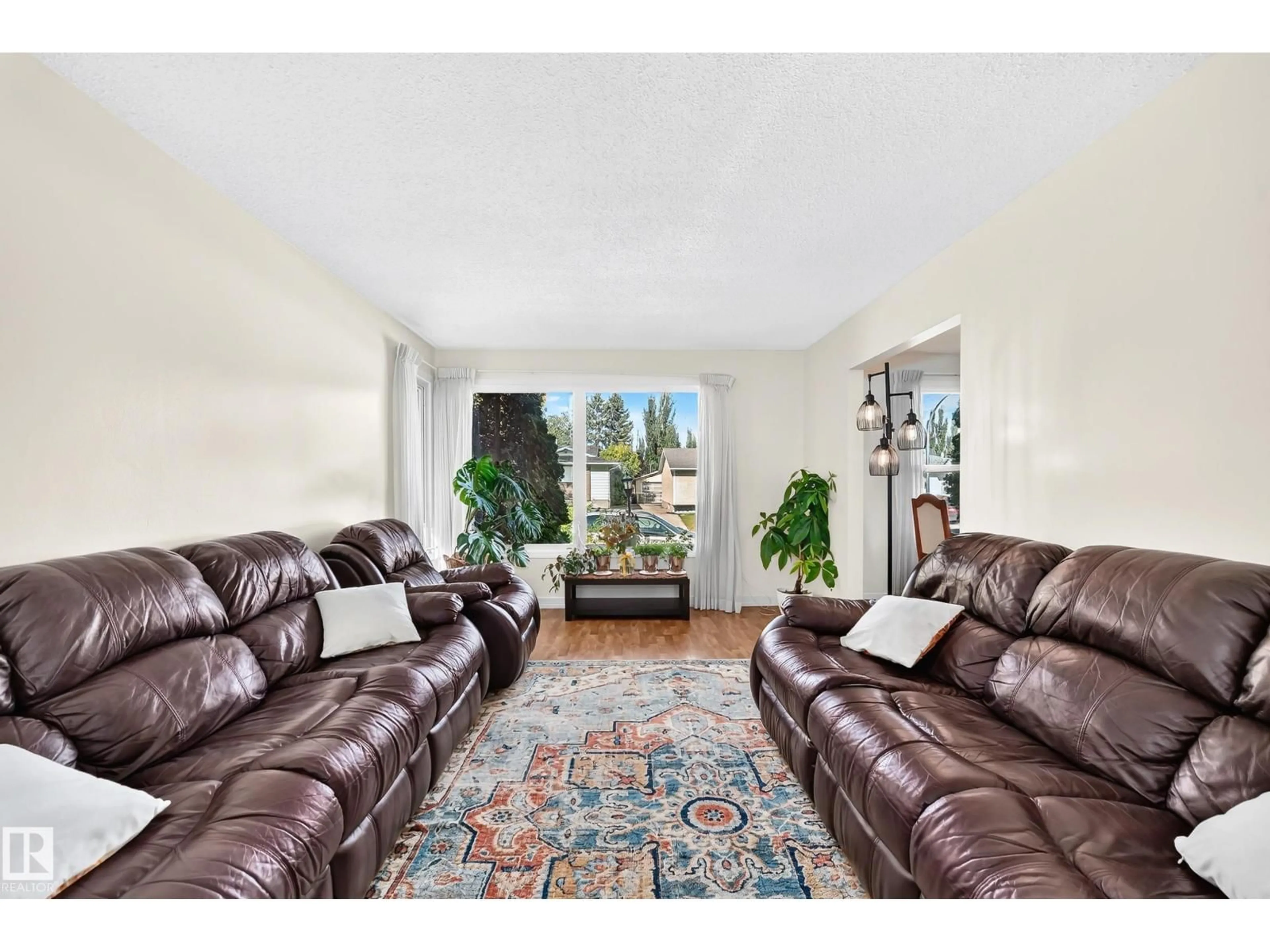 Living room with furniture, unknown for 11007 173A AV, Edmonton Alberta T5X3Y9