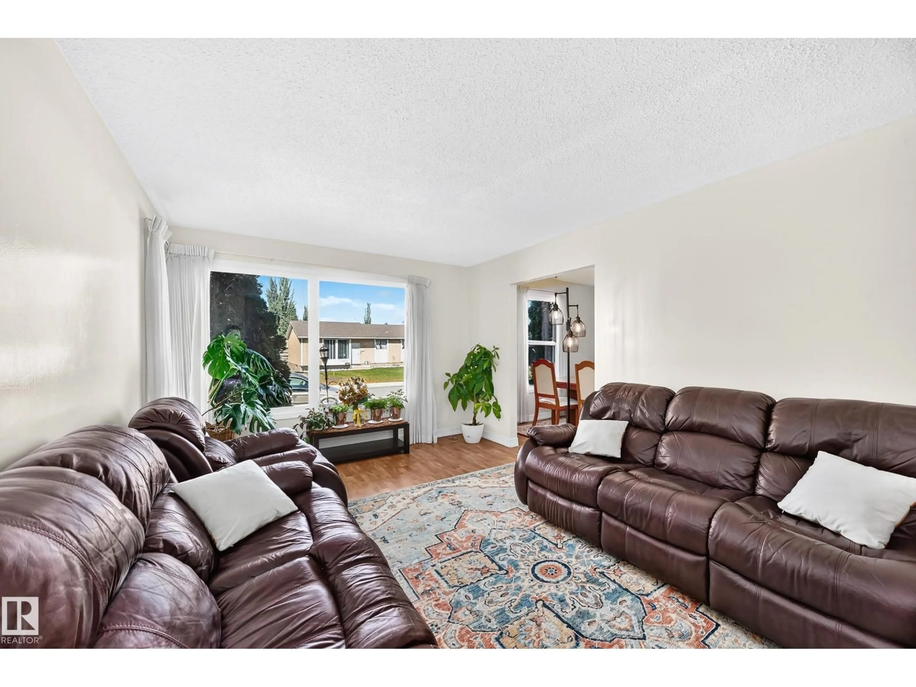 Living room with furniture, unknown for 11007 173A AV, Edmonton Alberta T5X3Y9