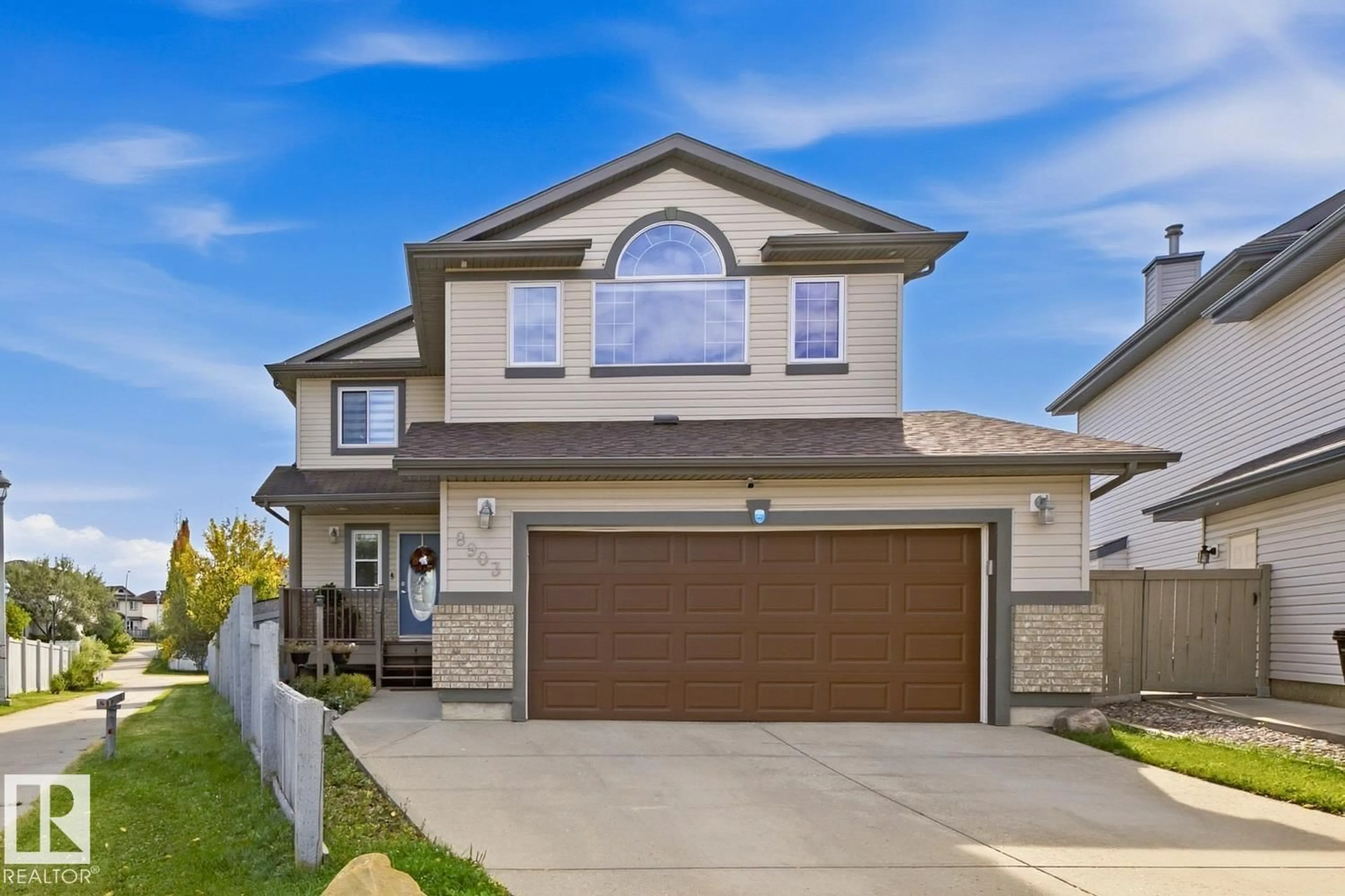 Home with vinyl exterior material, street for 8903 176 AV, Edmonton Alberta T5Z0A7