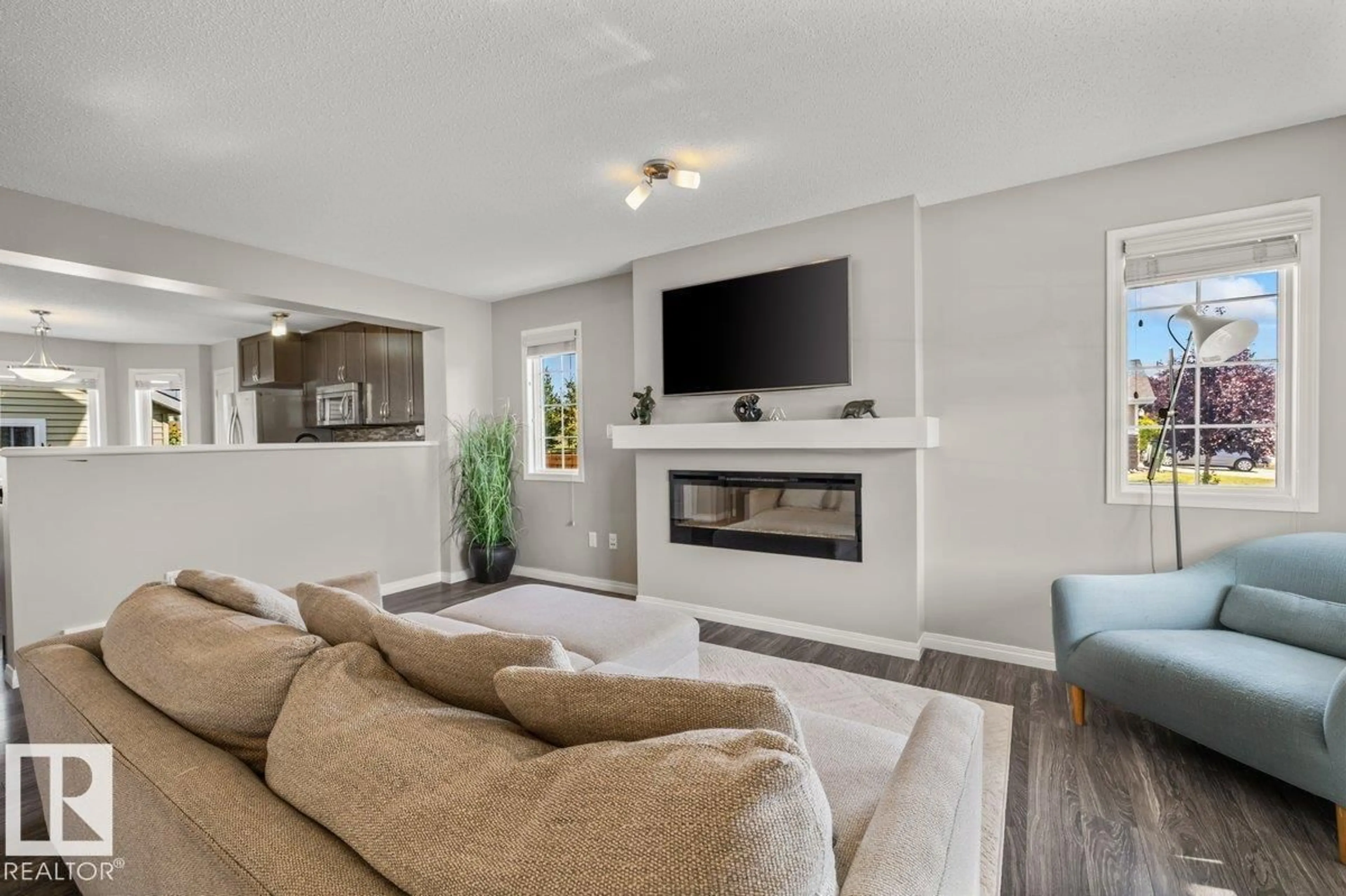 Living room with furniture, unknown for 6906 23 AV, Edmonton Alberta T6X1Z3