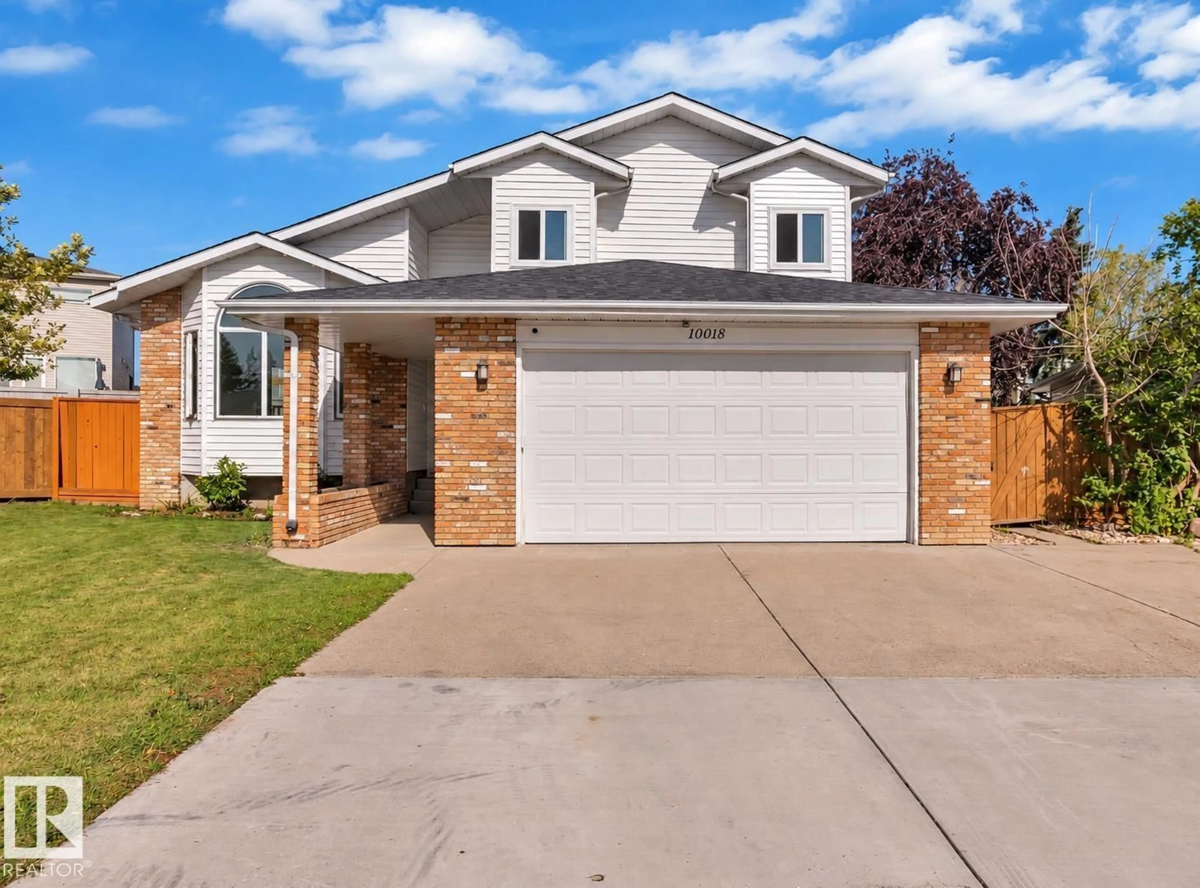 Home with brick exterior material, street for 10018 173 AV, Edmonton Alberta T5X3X9