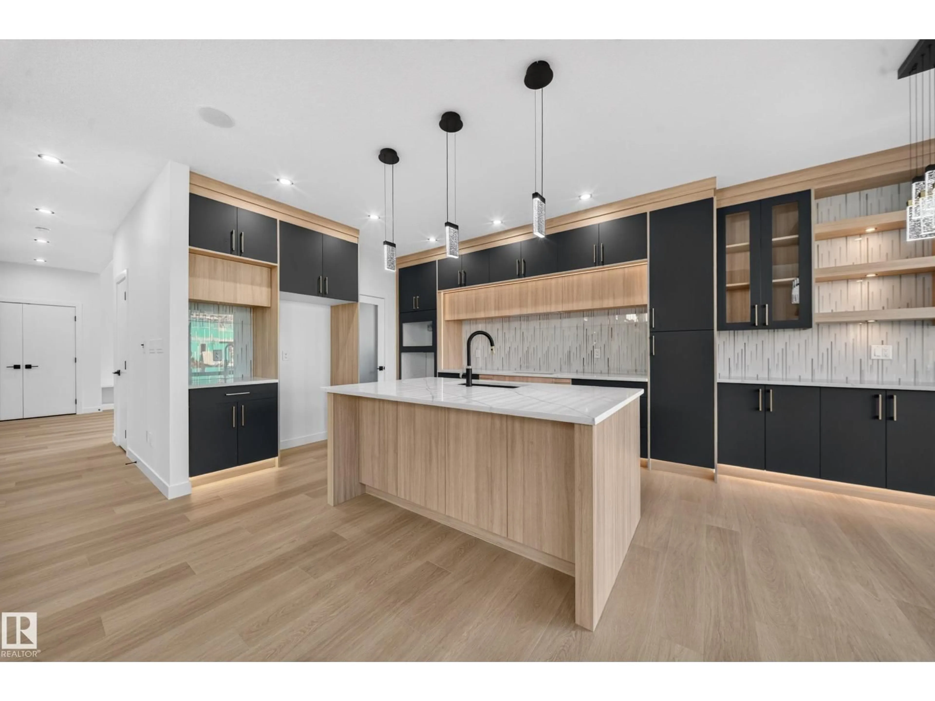 Open concept kitchen, wood/laminate floor for NW - 13024 186 AVENUE, Edmonton Alberta T6V0N3