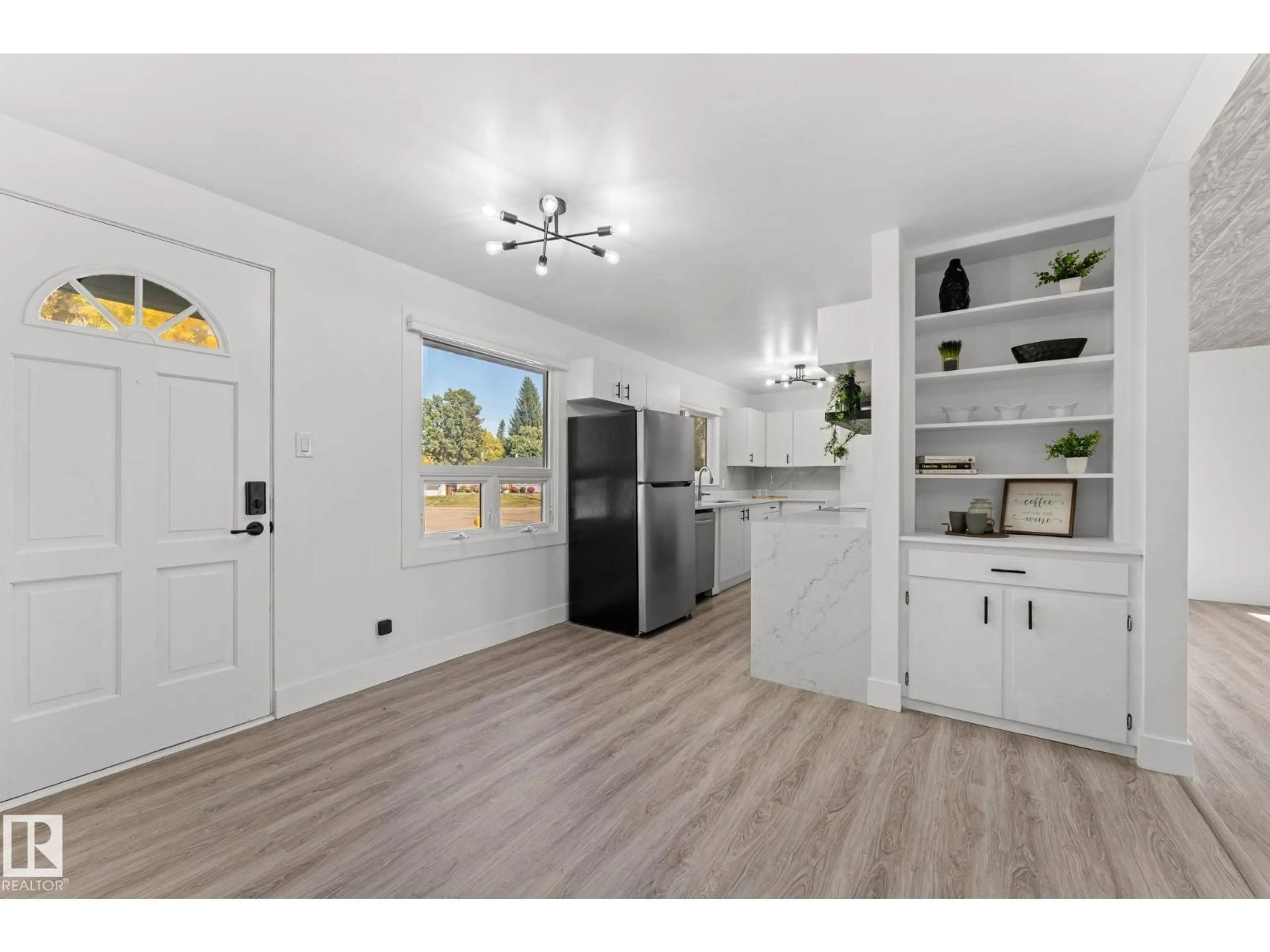 Open concept kitchen, wood/laminate floor for 970 ALDER AVE, Sherwood Park Alberta T8A1V6