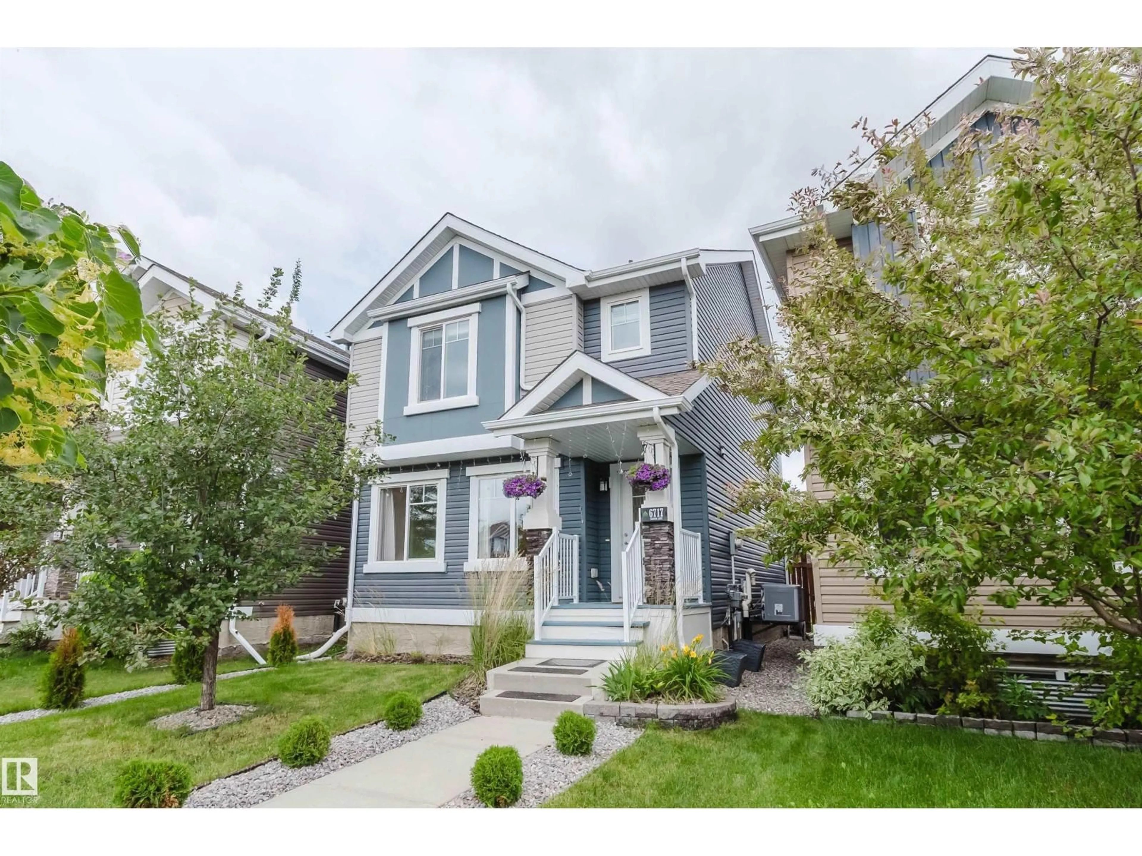 Home with vinyl exterior material, street for 6717 ELSTON LN, Edmonton Alberta T6M0T4