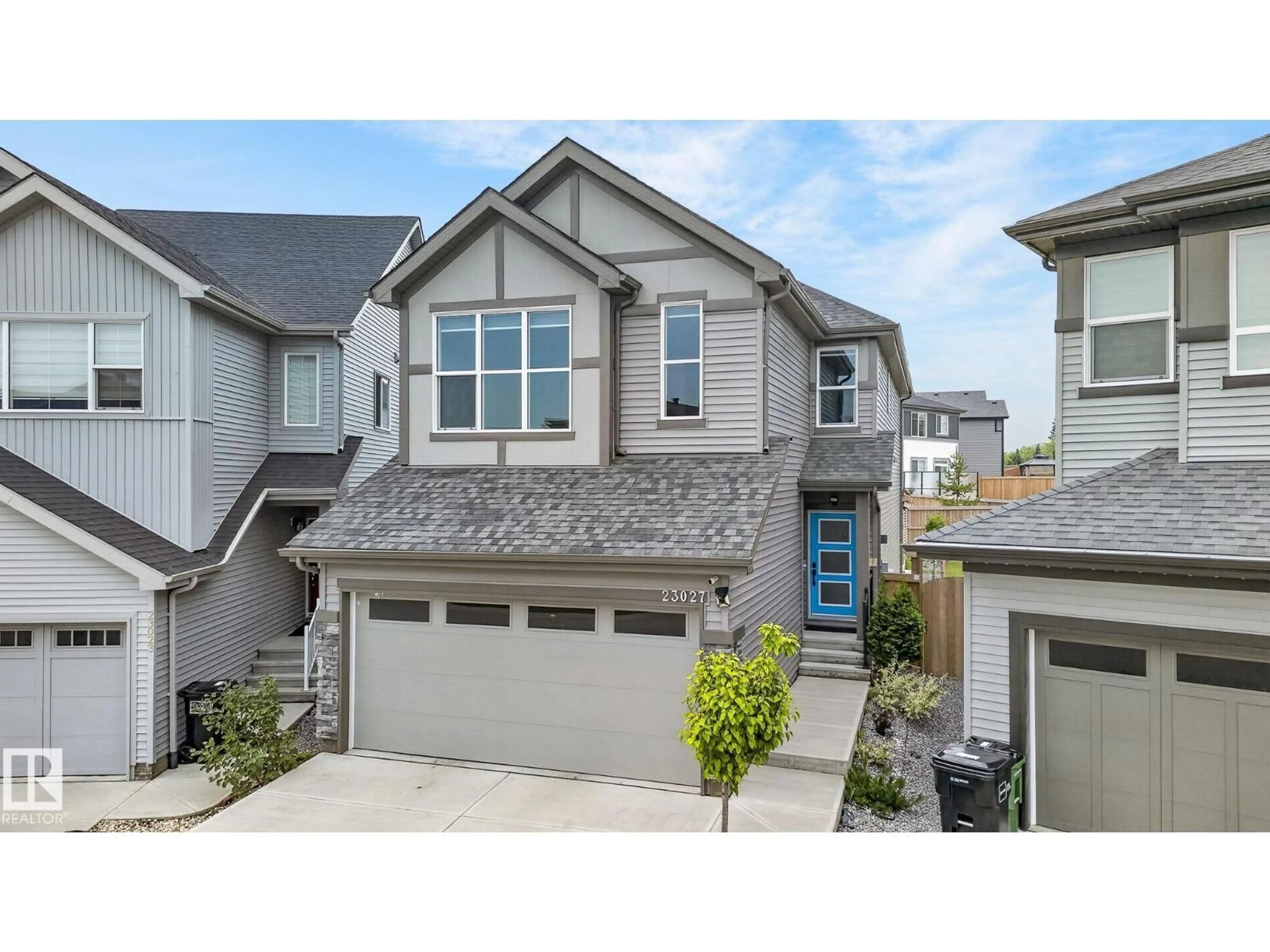 Home with vinyl exterior material, street for 23027 96 AV, Edmonton Alberta T5T7R4