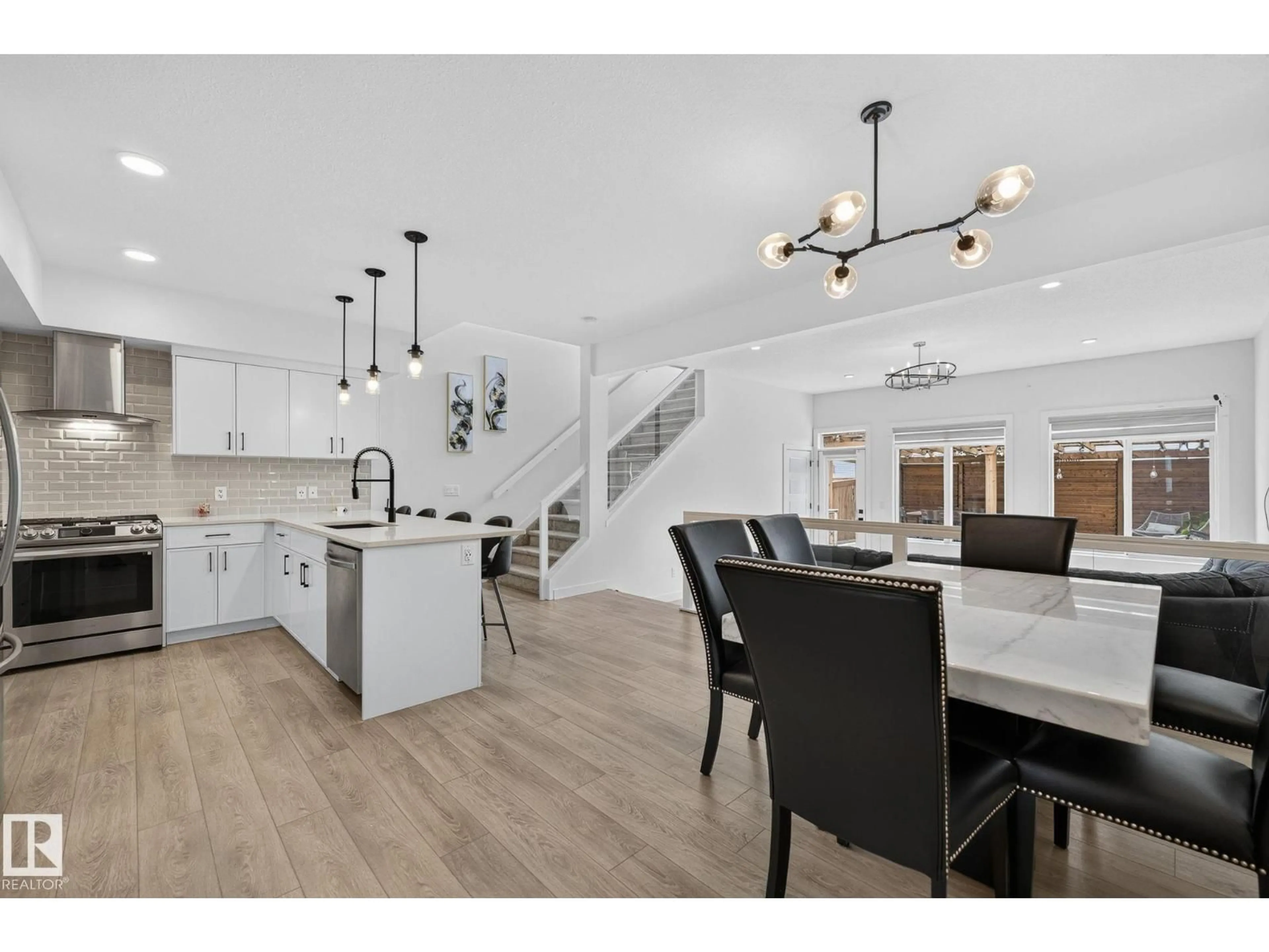Open concept kitchen, unknown for 23027 96 AV, Edmonton Alberta T5T7R4