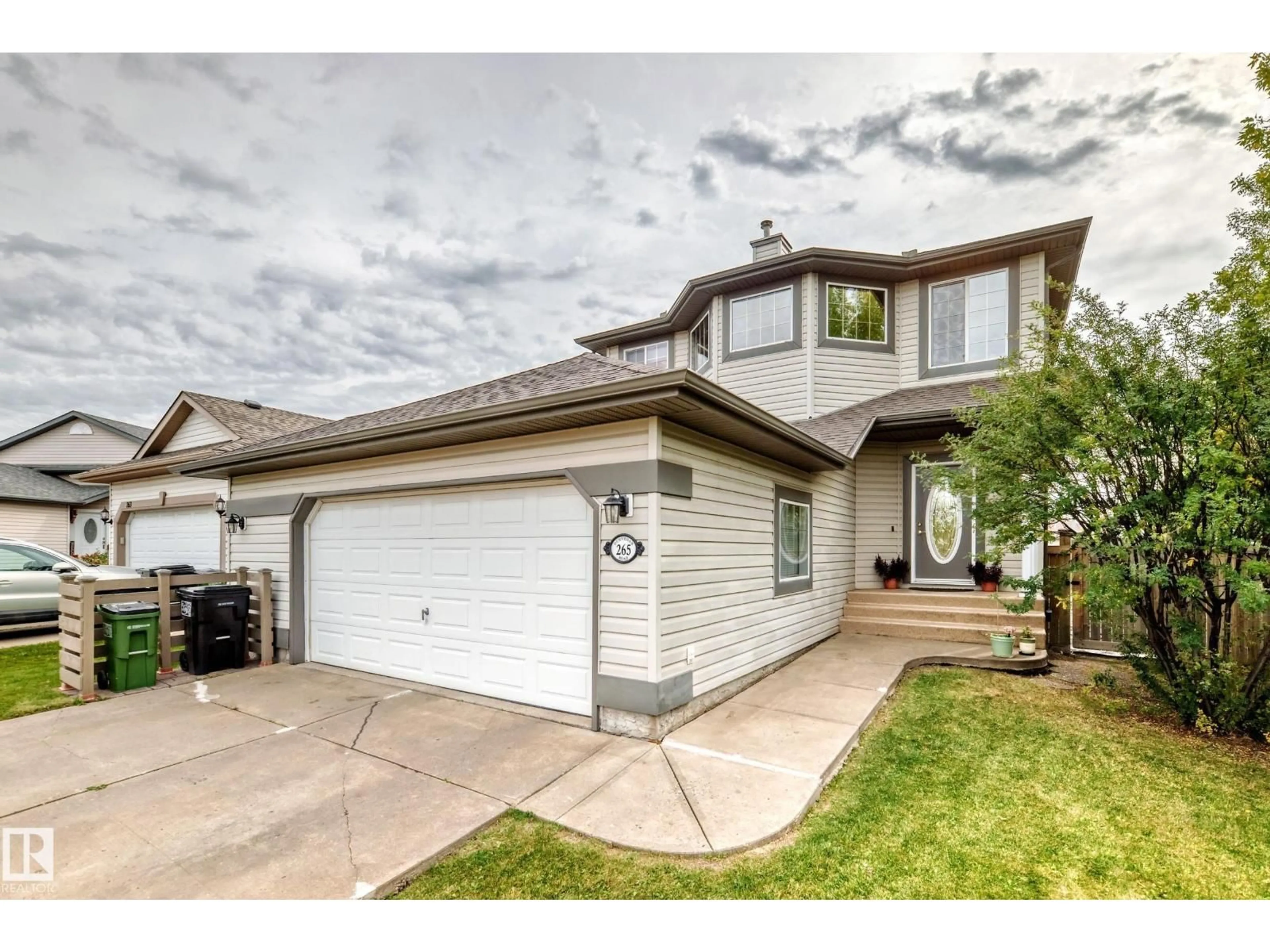 Home with vinyl exterior material, street for 265 DUNVEGAN RD, Edmonton Alberta T5L5E5