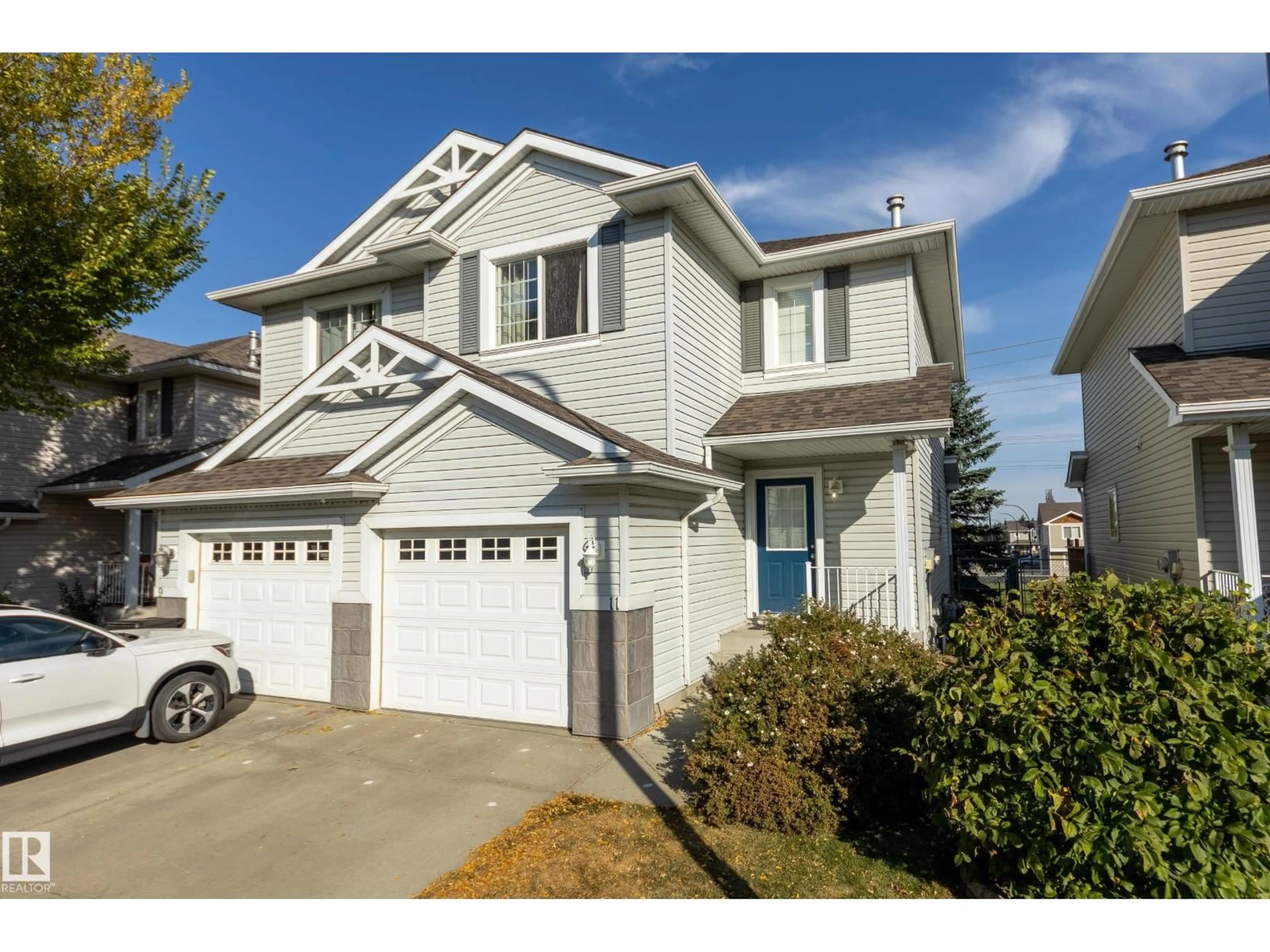 Home with vinyl exterior material, street for 11 - 115 CHESTERMERE DR, Sherwood Park Alberta T8H2W4