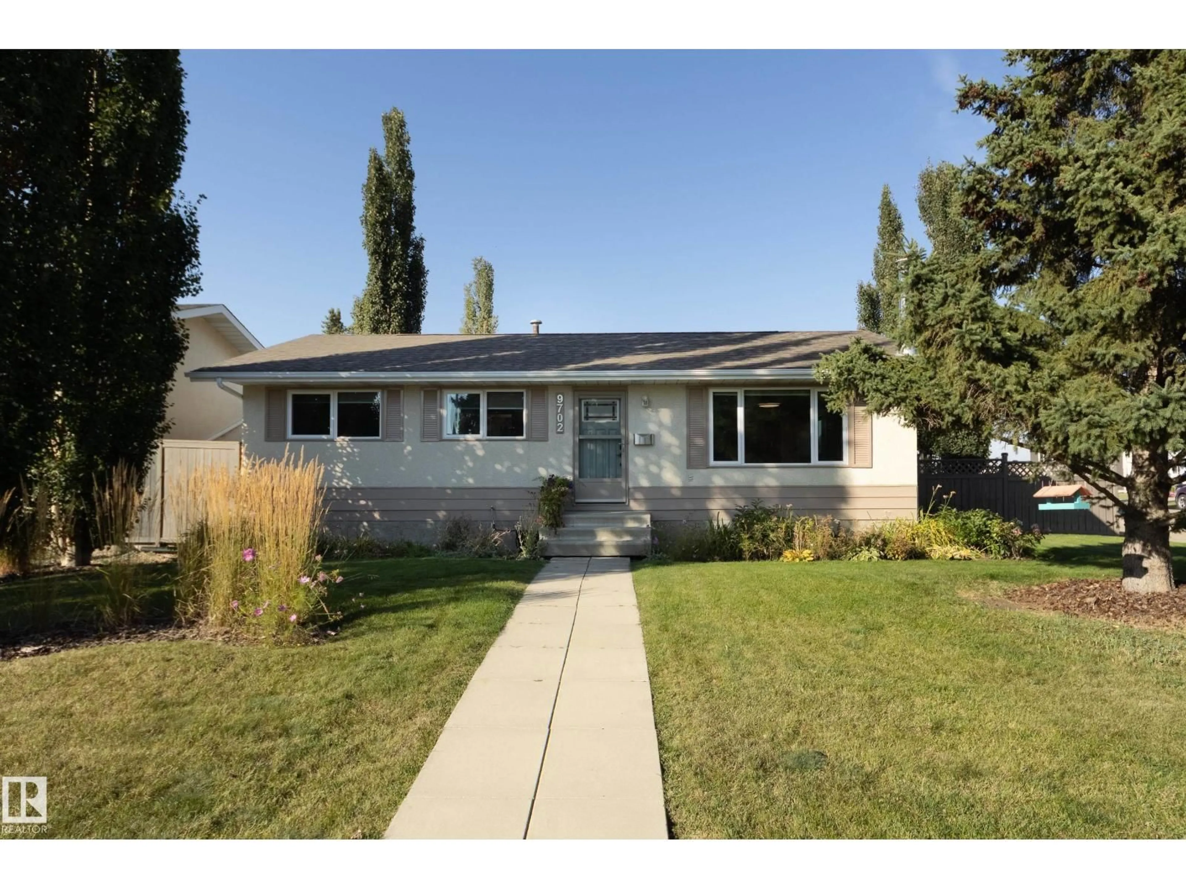 Home with vinyl exterior material, street for 9702 99A AV, Morinville Alberta T8R1G6