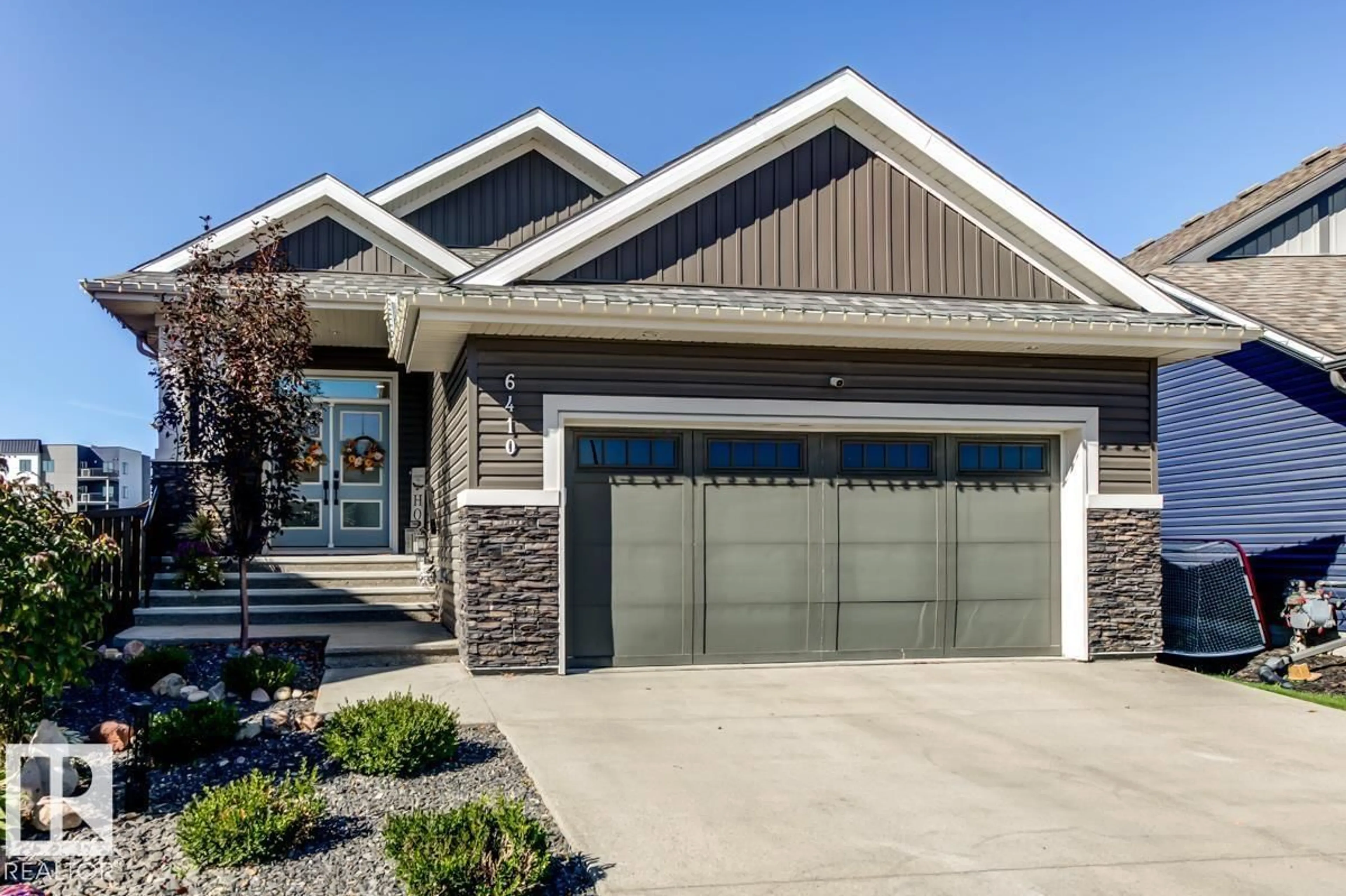 Home with vinyl exterior material, street for 6410 DANSEREAU CR, Beaumont Alberta T4X2Y6