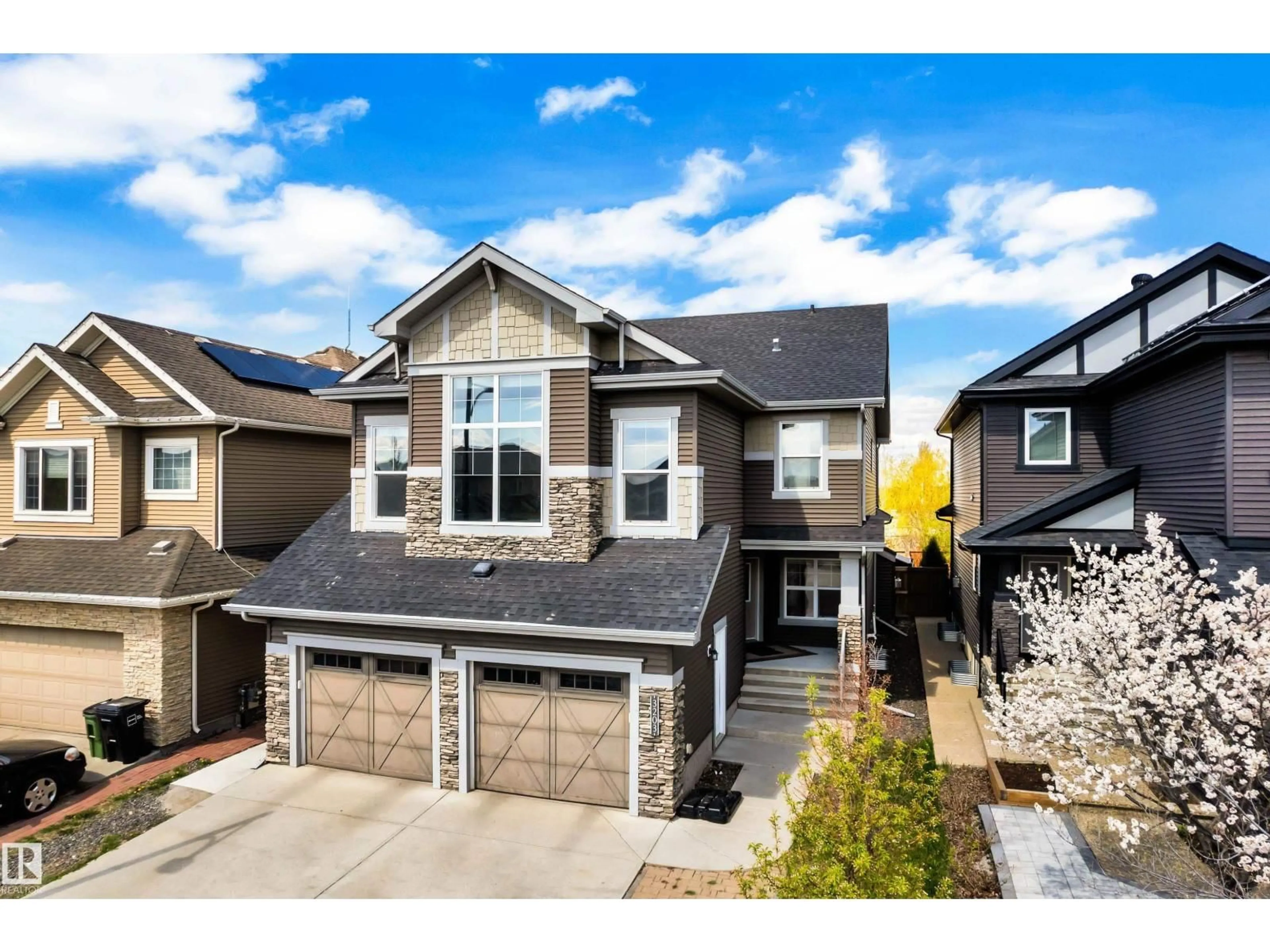 Home with vinyl exterior material, street for SW - 3203 WINSPEAR CR, Edmonton Alberta T6X1S7