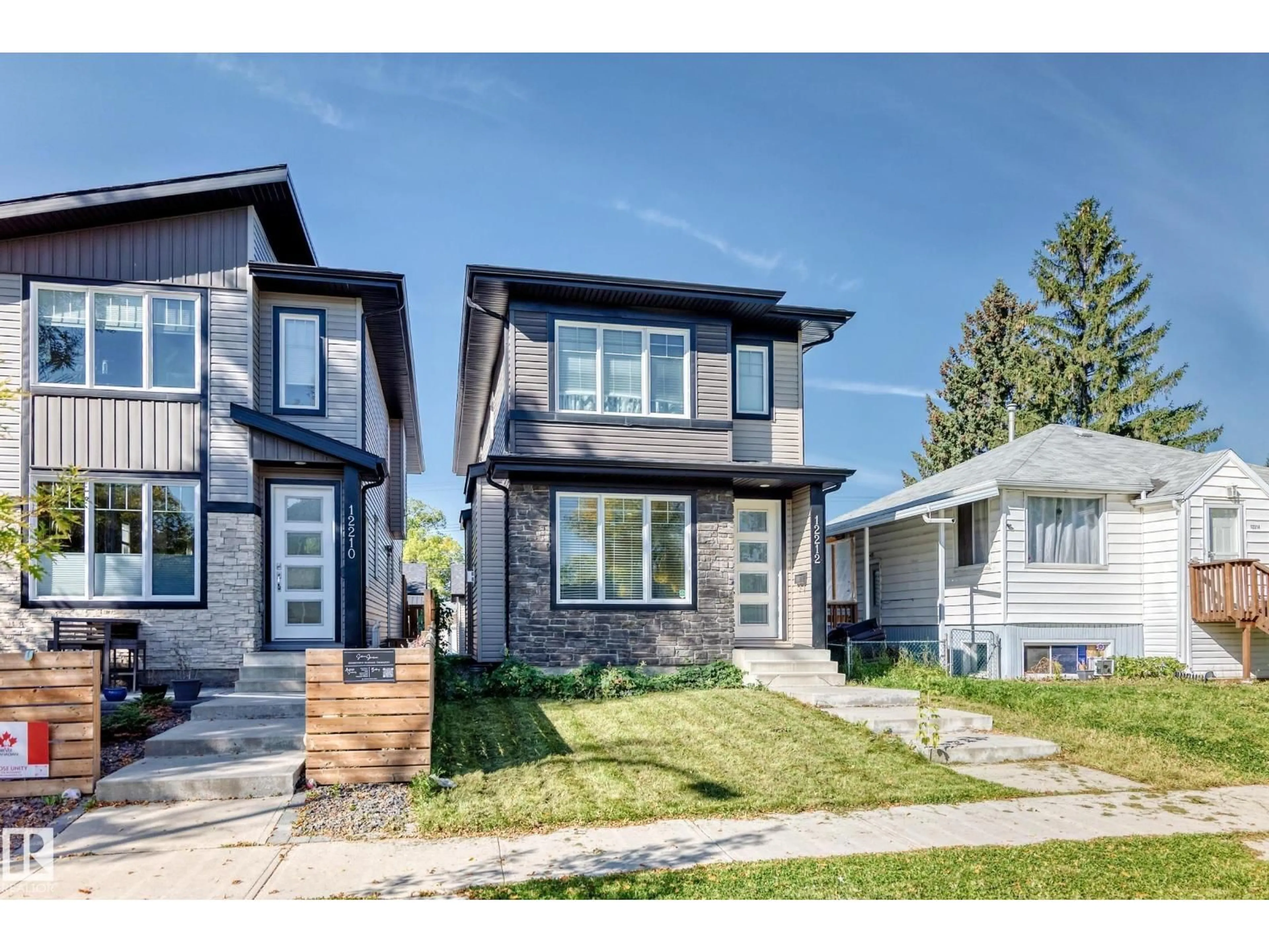 Home with vinyl exterior material, street for 12212 124 ST NW, Edmonton Alberta T5L0N2
