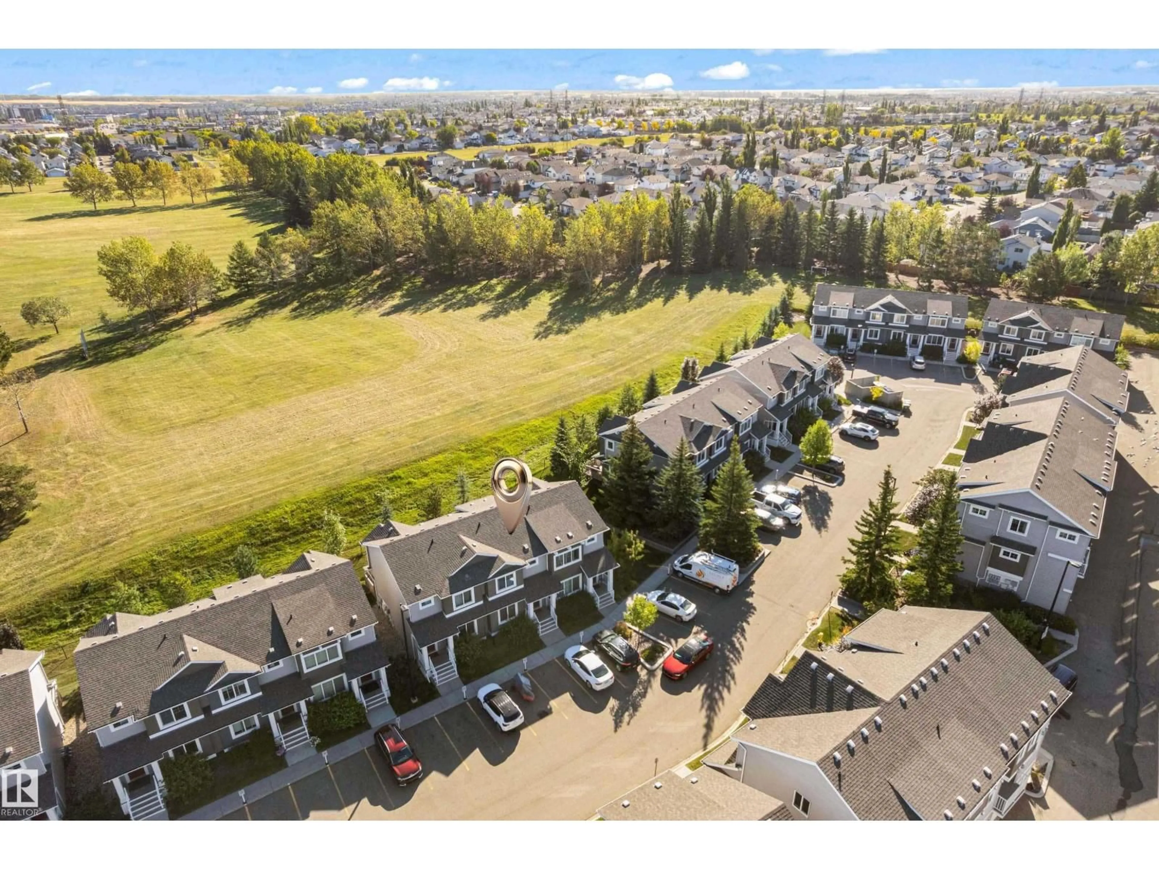 A pic from outside/outdoor area/front of a property/back of a property/a pic from drone, mountain view for #22 - 4205 30 ST, Edmonton Alberta T6T2G9