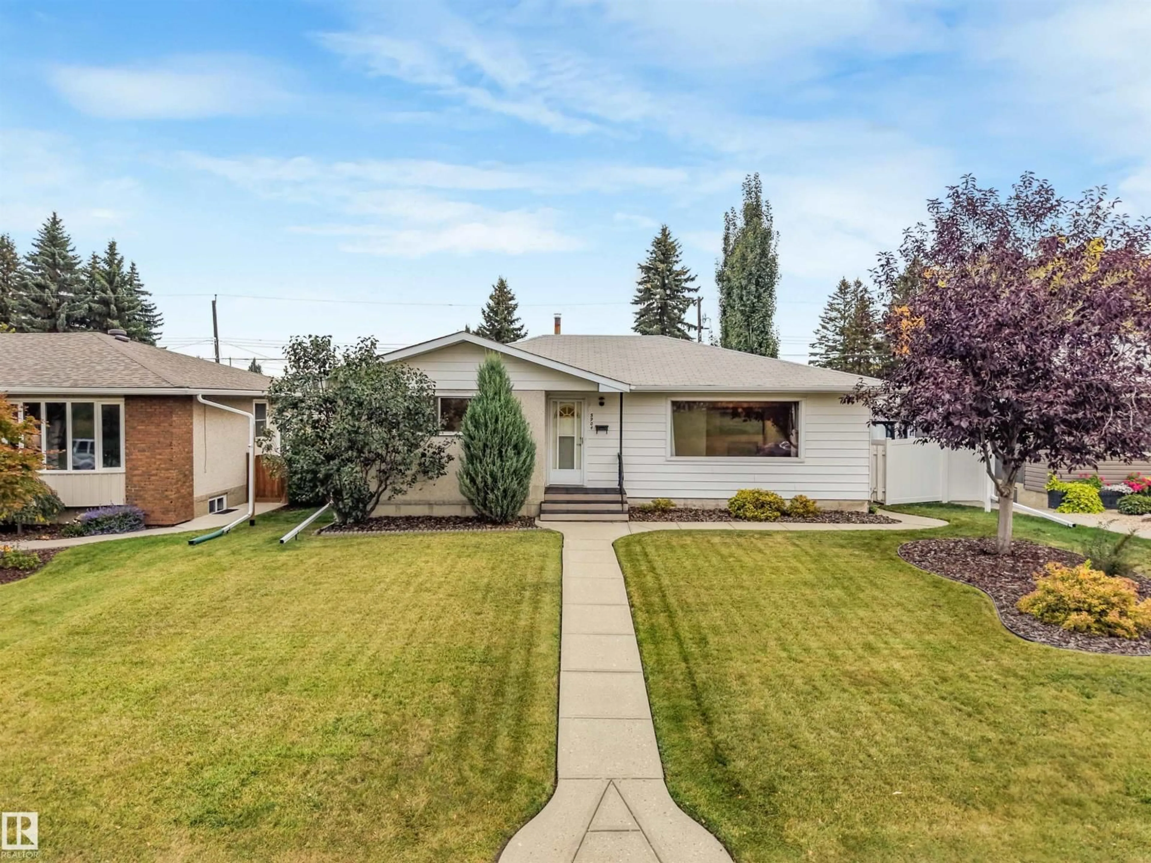 Home with vinyl exterior material, street for 5904 94 AV, Edmonton Alberta T6B0X8