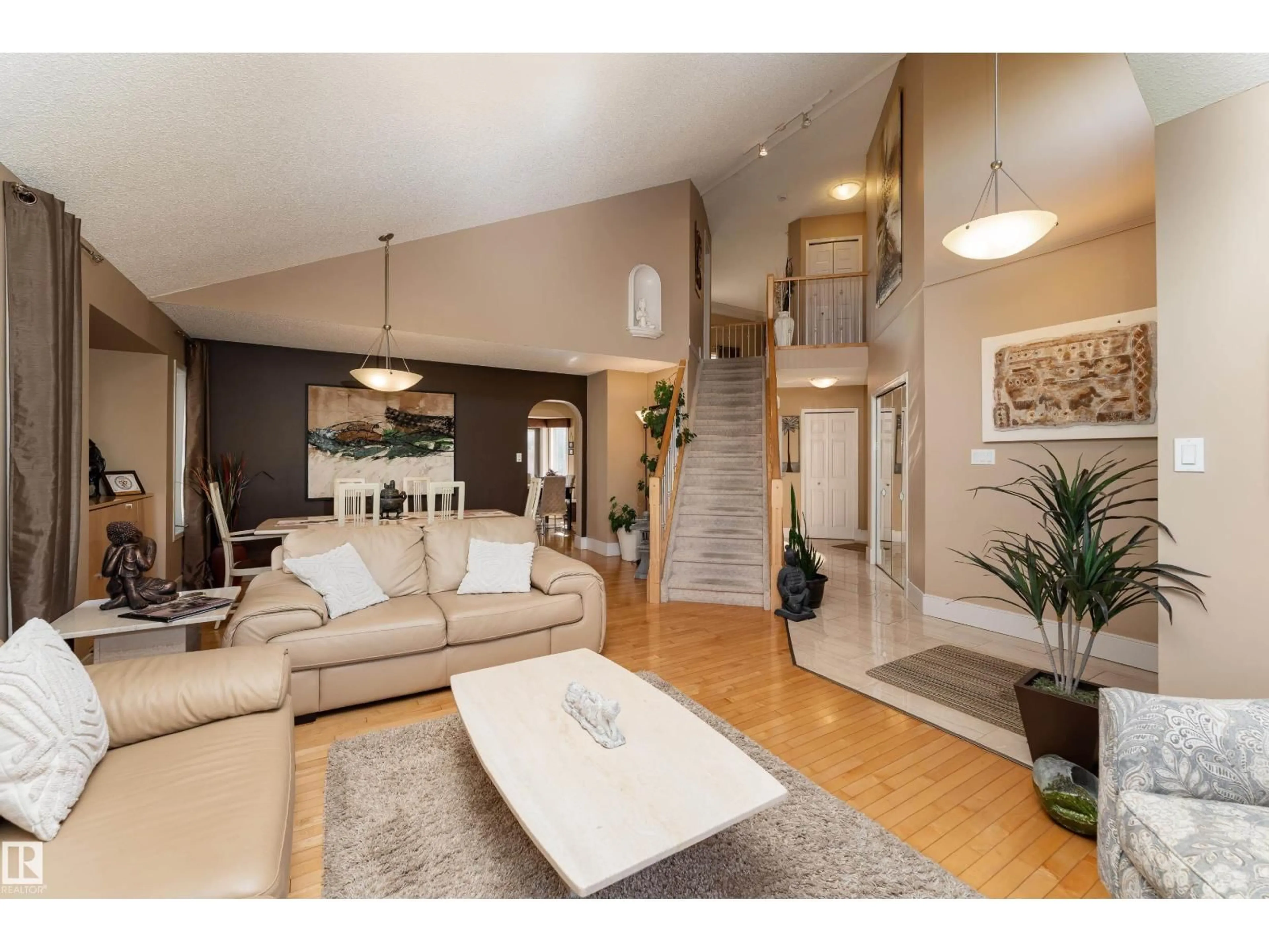 Living room with furniture, wood/laminate floor for 18919 91 AV, Edmonton Alberta T5T5V9