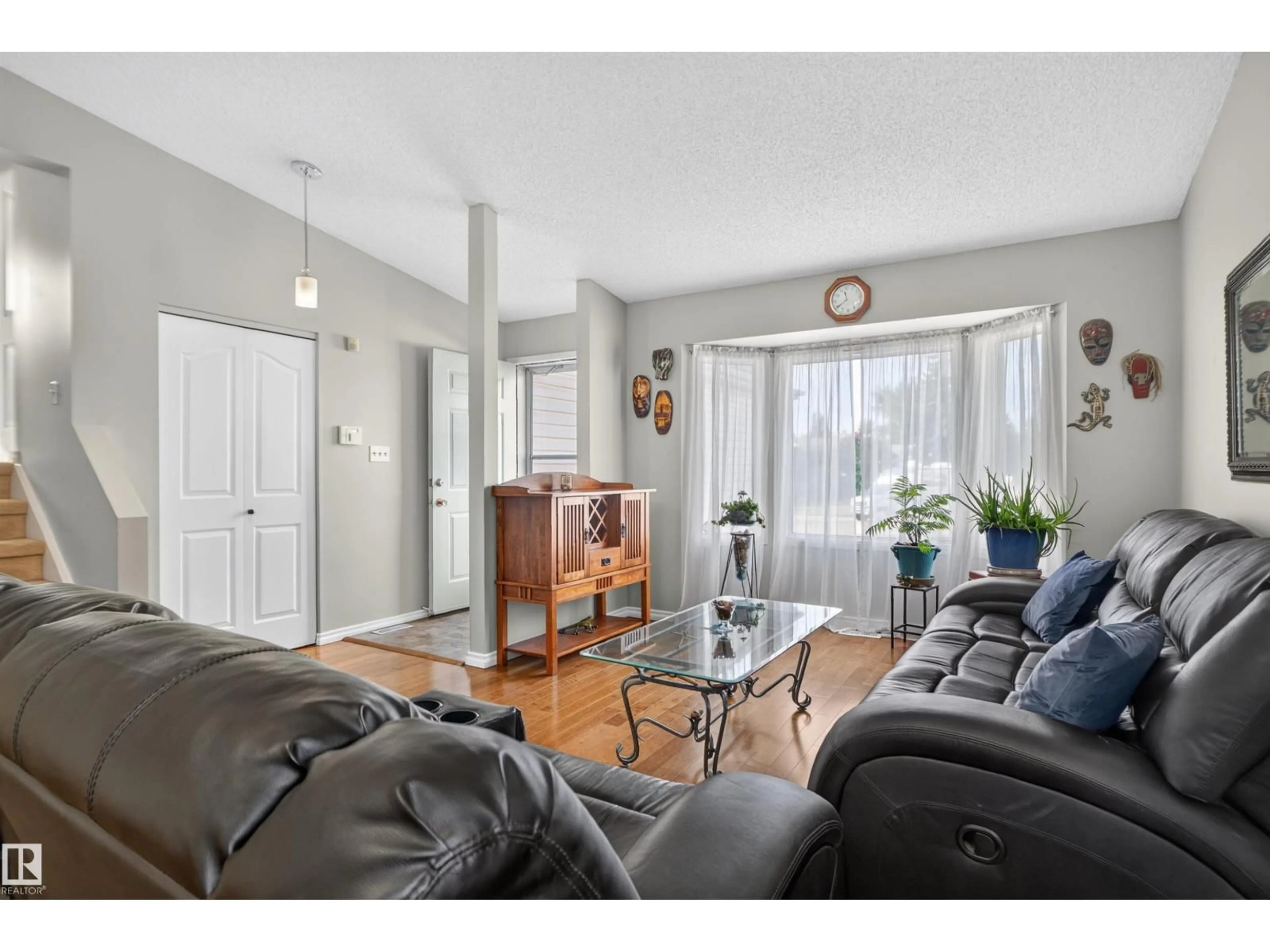 Living room with furniture, unknown for 1519 104 ST, Edmonton Alberta T6J5T2
