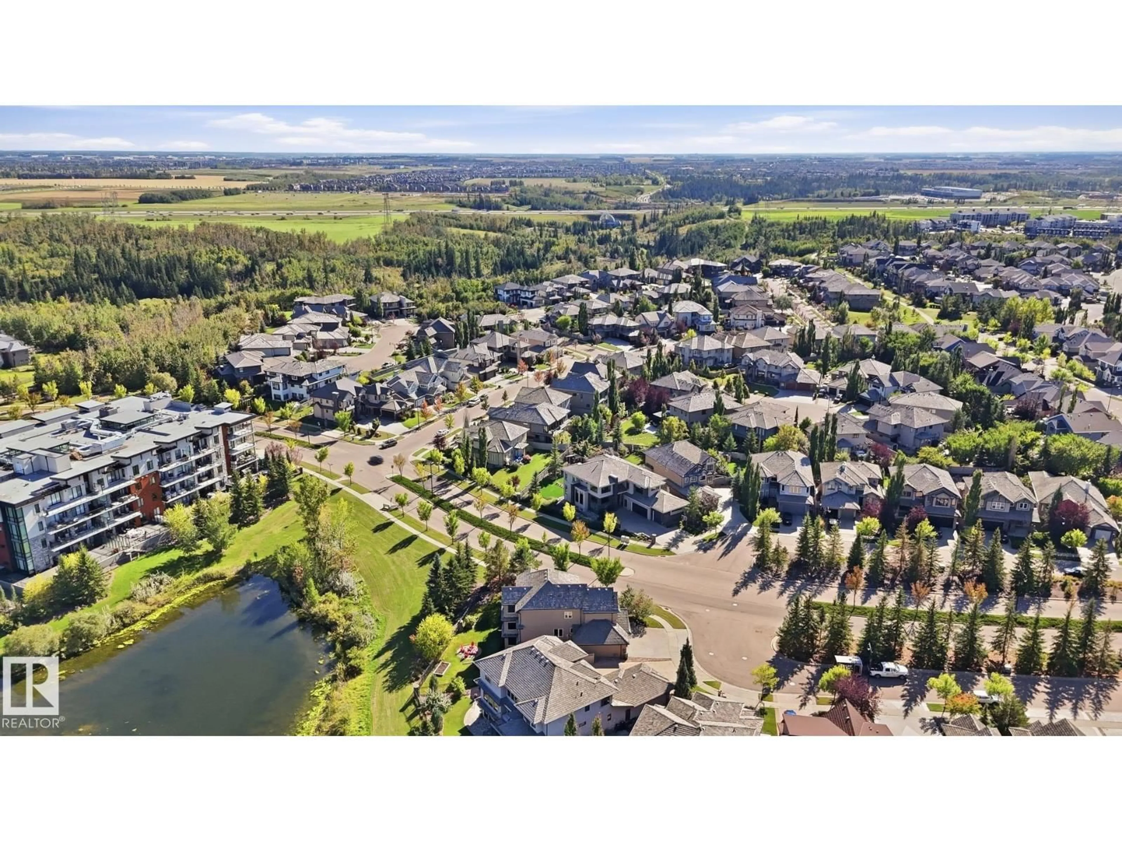 A pic from outside/outdoor area/front of a property/back of a property/a pic from drone, water/lake/river/ocean view for 4024 MACTAGGART DR, Edmonton Alberta T6R0J3