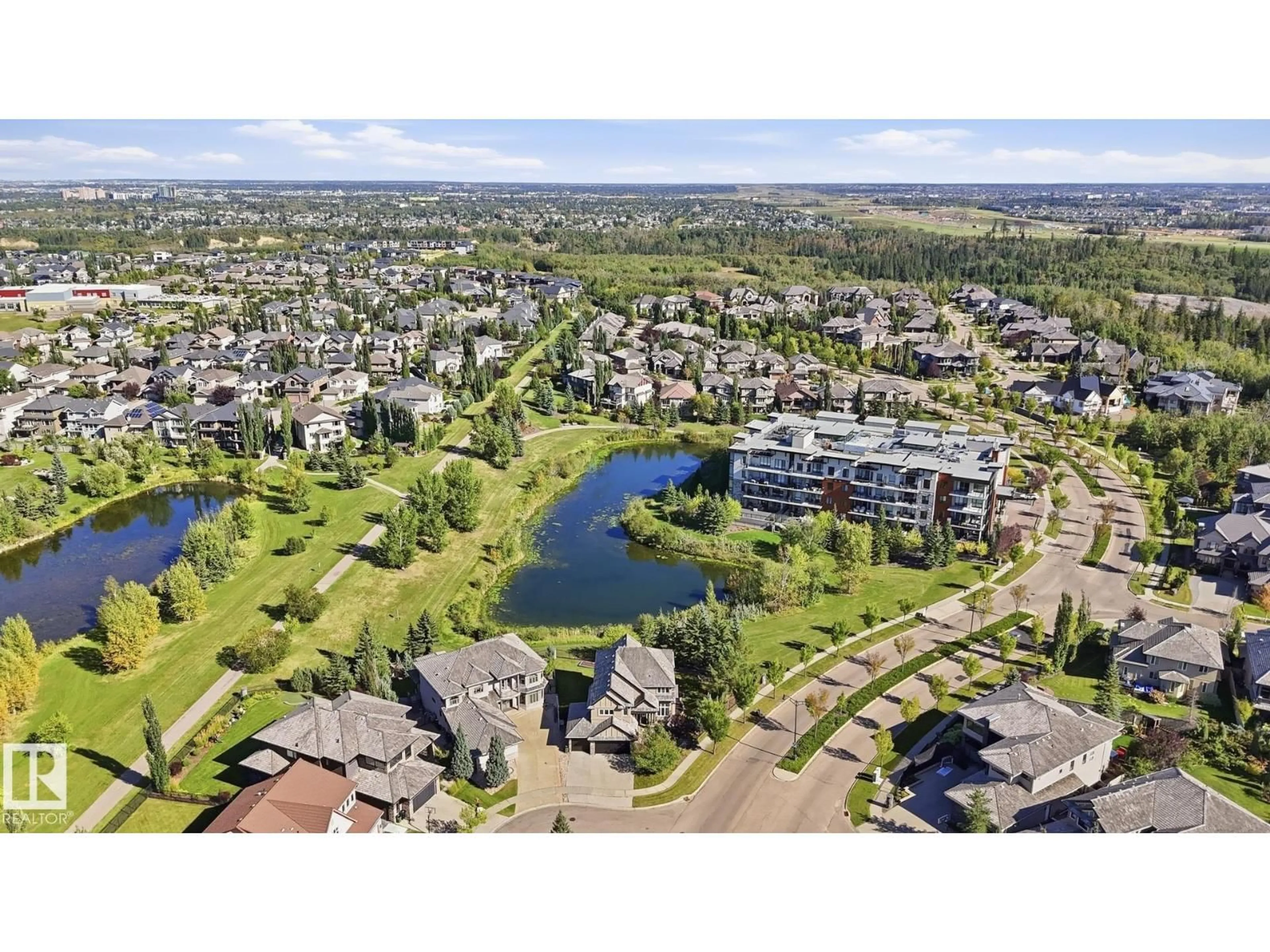 A pic from outside/outdoor area/front of a property/back of a property/a pic from drone, water/lake/river/ocean view for 4024 MACTAGGART DR, Edmonton Alberta T6R0J3