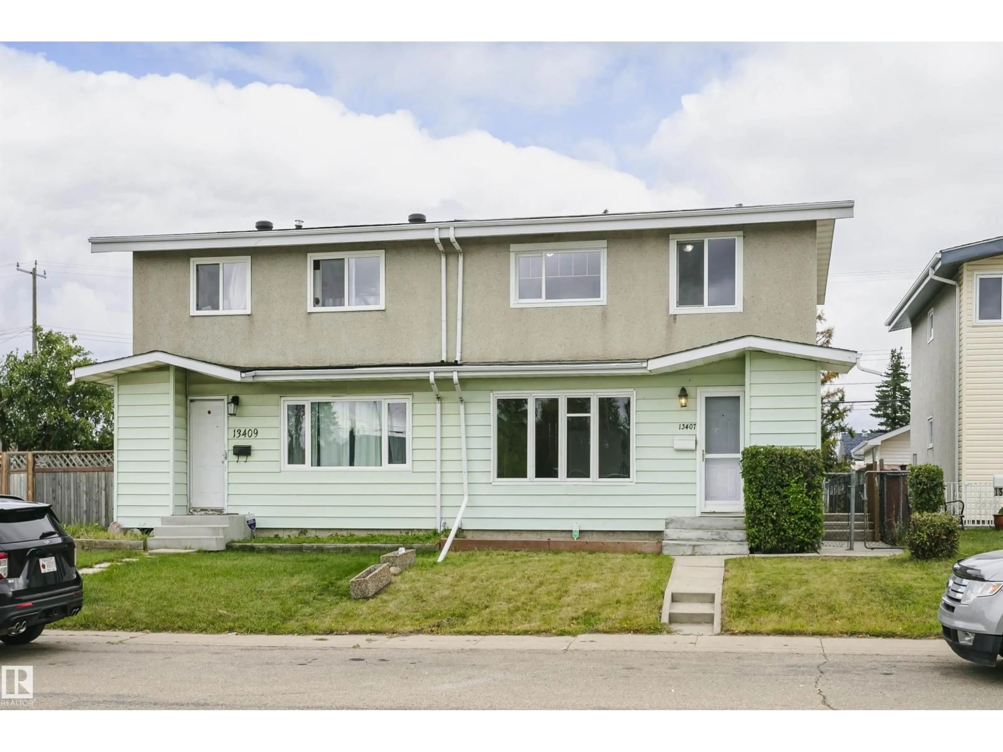 Home with vinyl exterior material, street for NW - 13407 82 ST, Edmonton Alberta T5E2T9