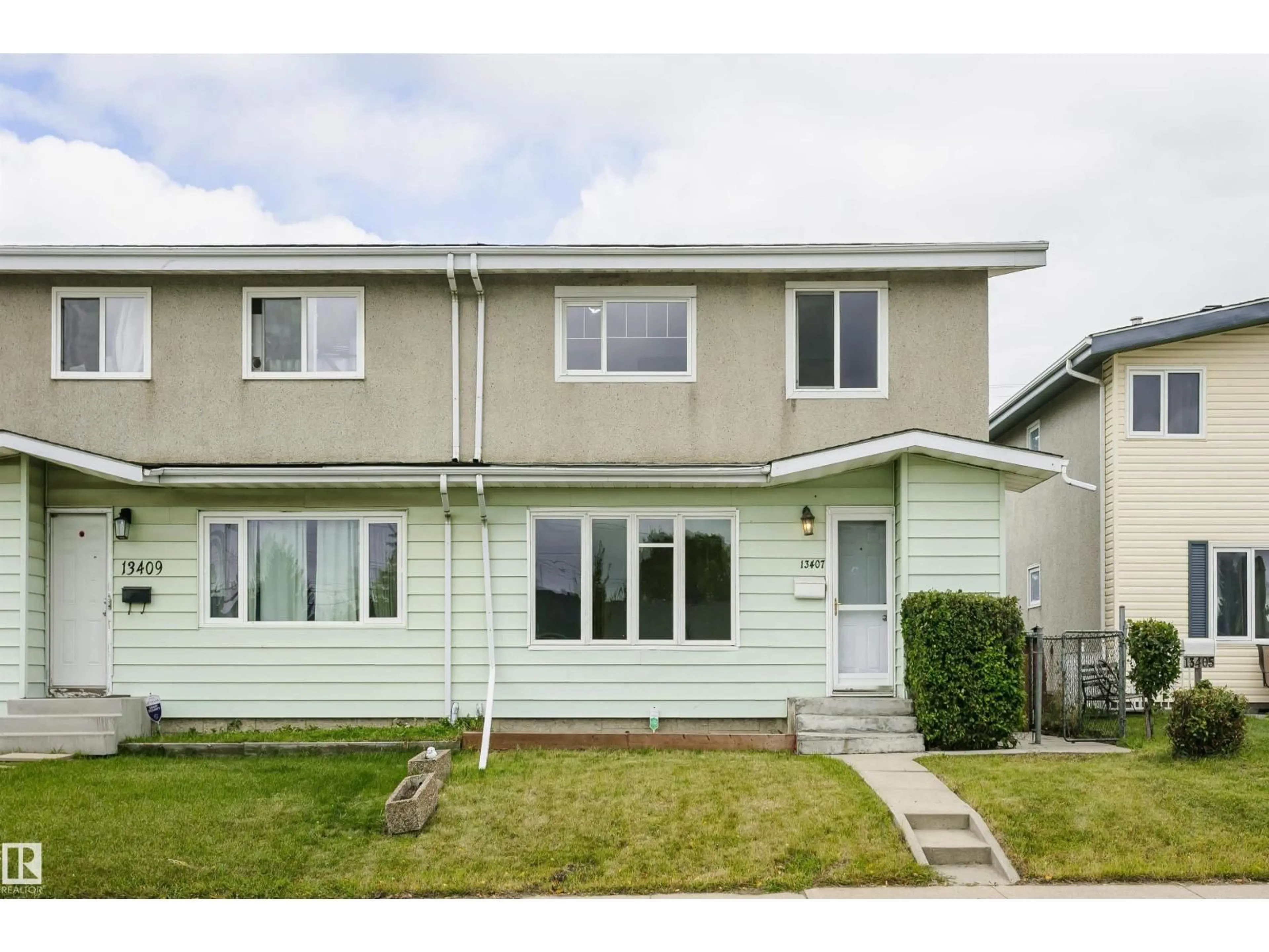 Home with vinyl exterior material, street for NW - 13407 82 ST, Edmonton Alberta T5E2T9